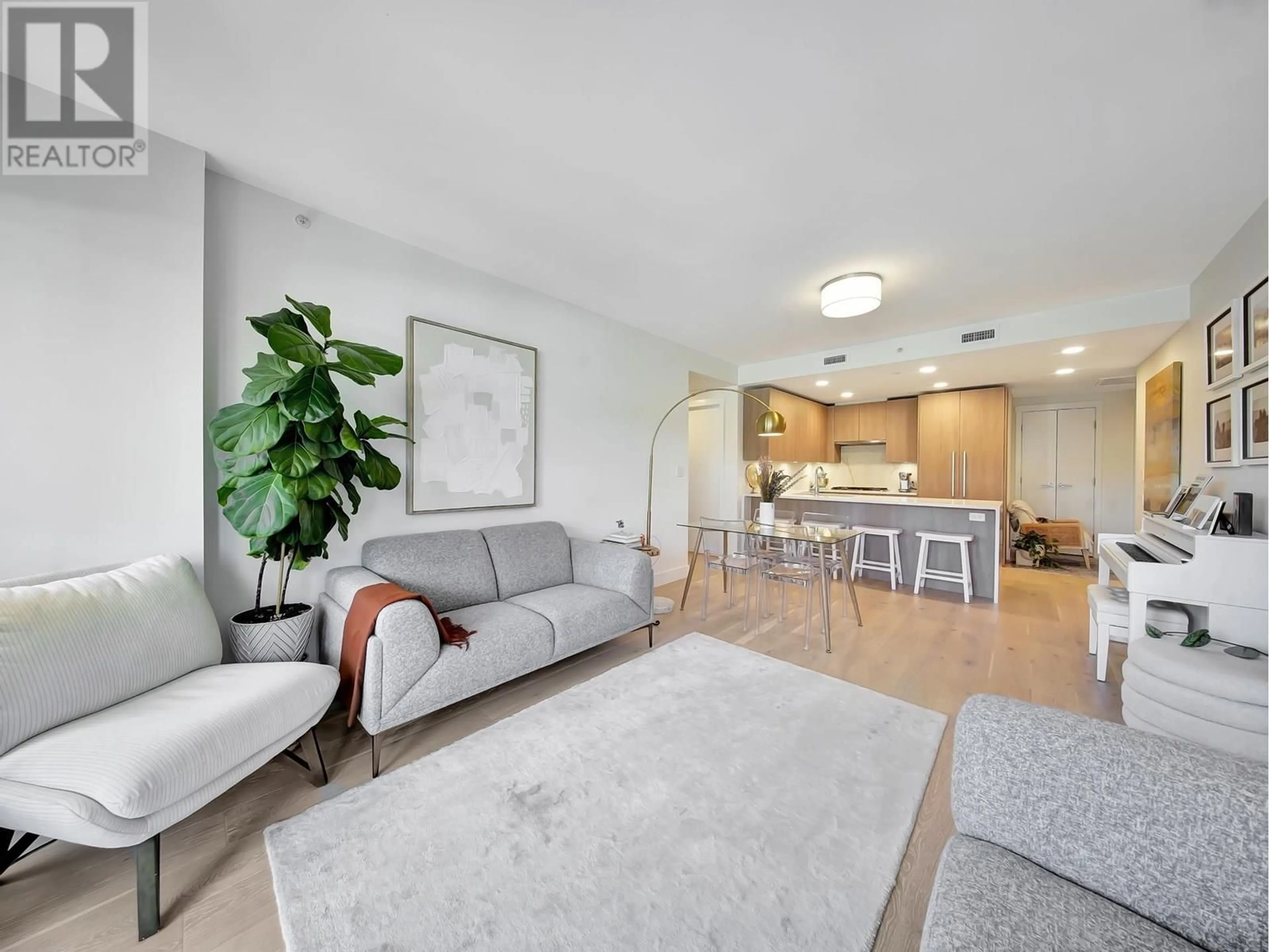 Living room with furniture, unknown for 702 - 2785 LIBRARY LANE, North Vancouver British Columbia V7J0C3