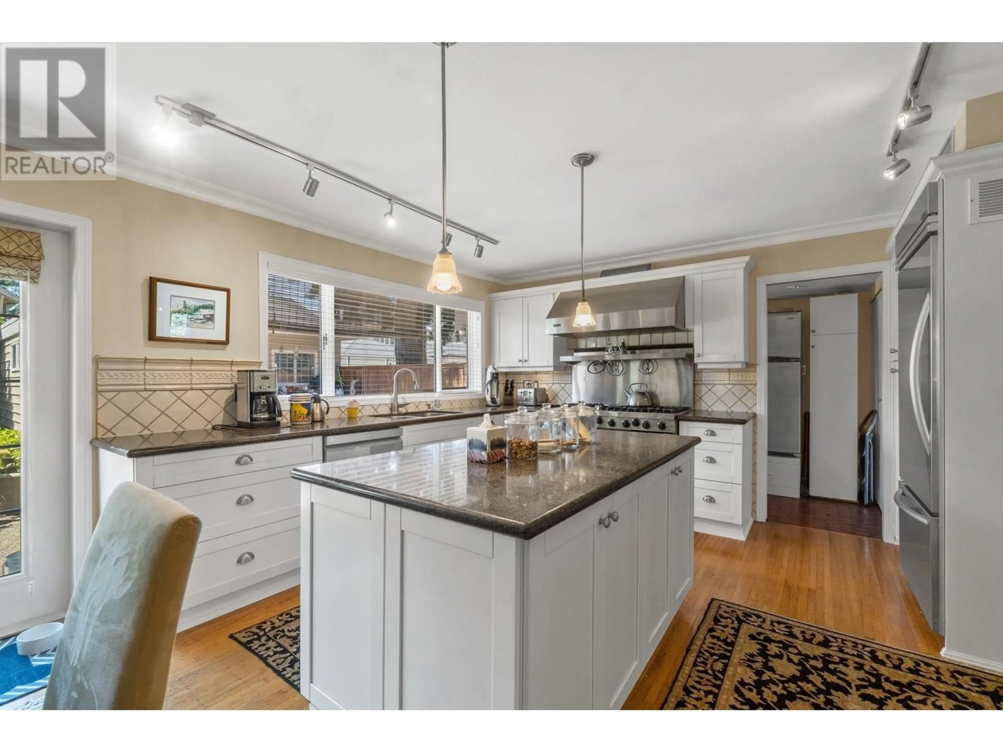 Open concept kitchen, unknown for 7215 WILTSHIRE STREET, Vancouver British Columbia V6P5H4