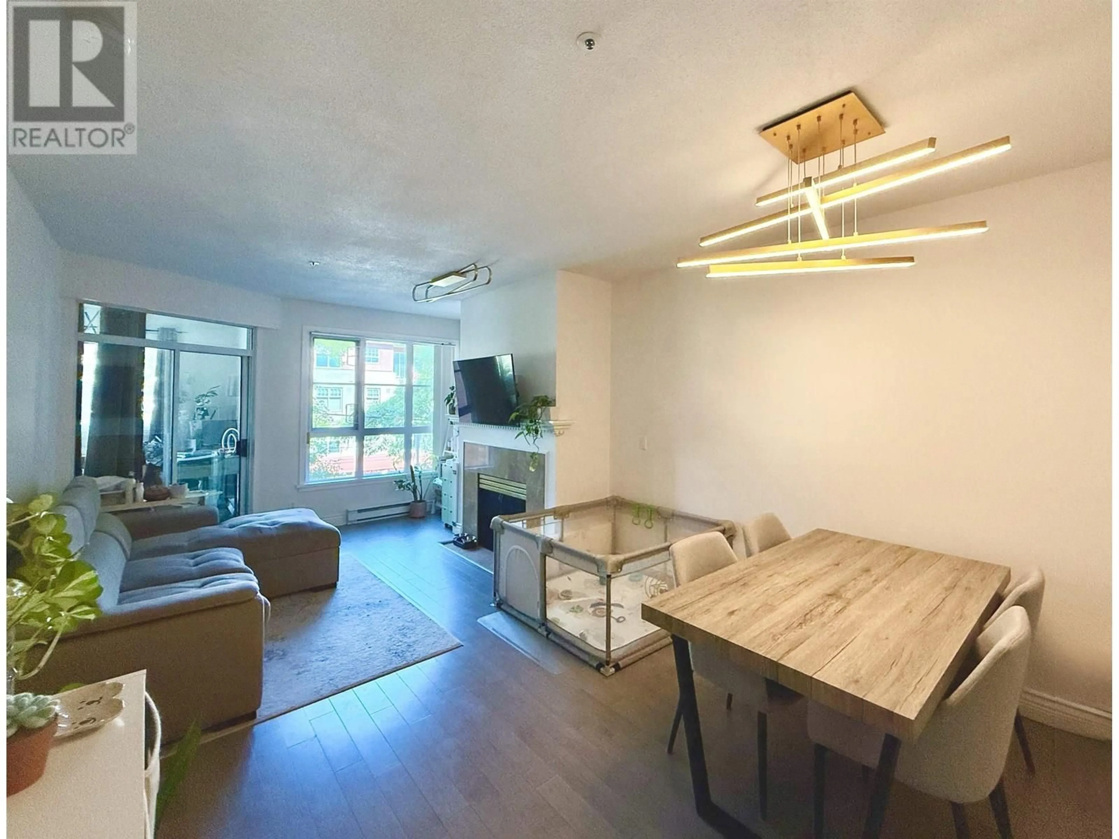 Living room with furniture, wood/laminate floor for 307 - 3621 26TH AVENUE, Vancouver British Columbia V6S1P2