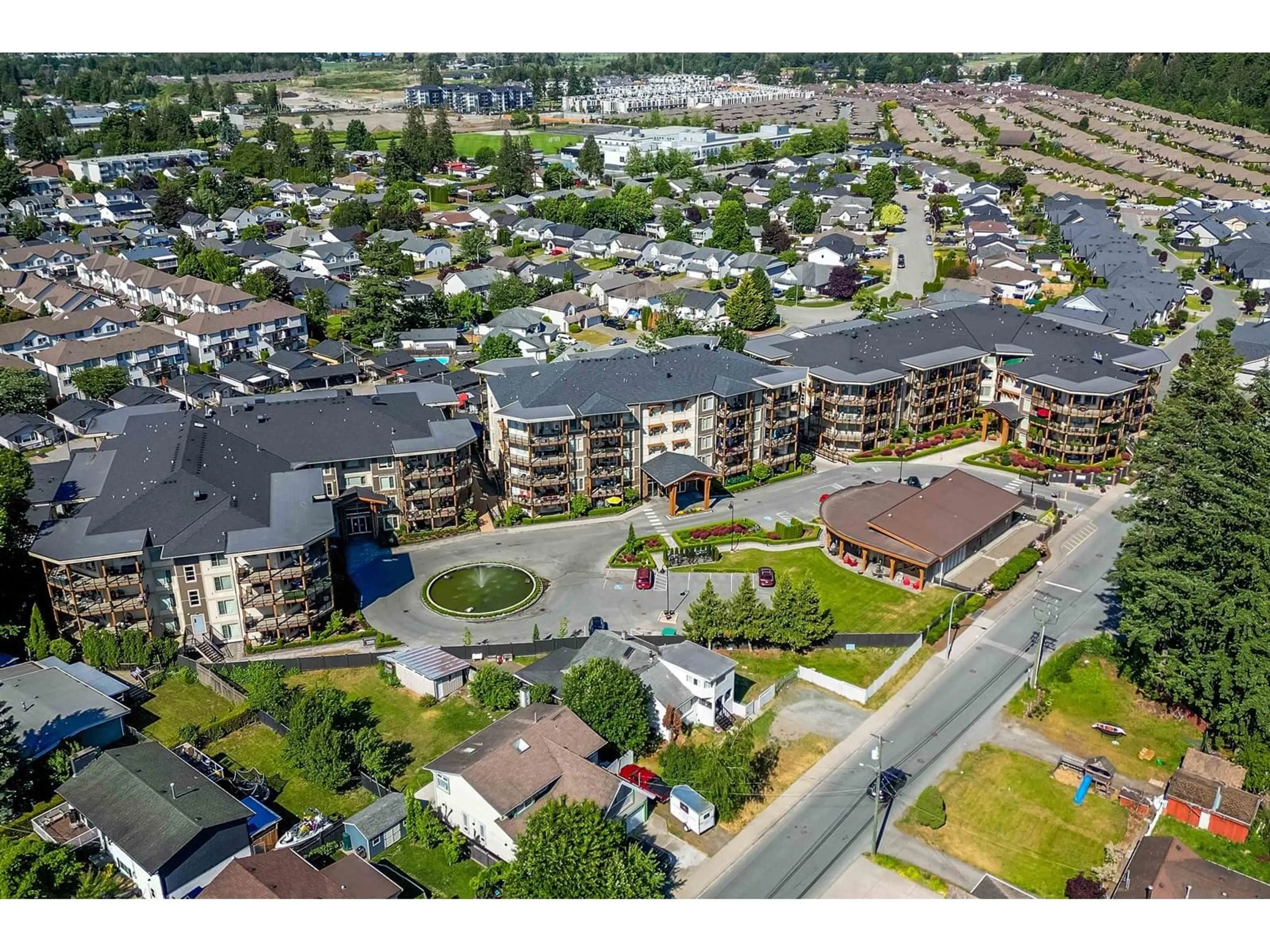A pic from outside/outdoor area/front of a property/back of a property/a pic from drone, unknown for 102 - 45750 KEITH WILSON ROAD, Chilliwack British Columbia V2R0X3