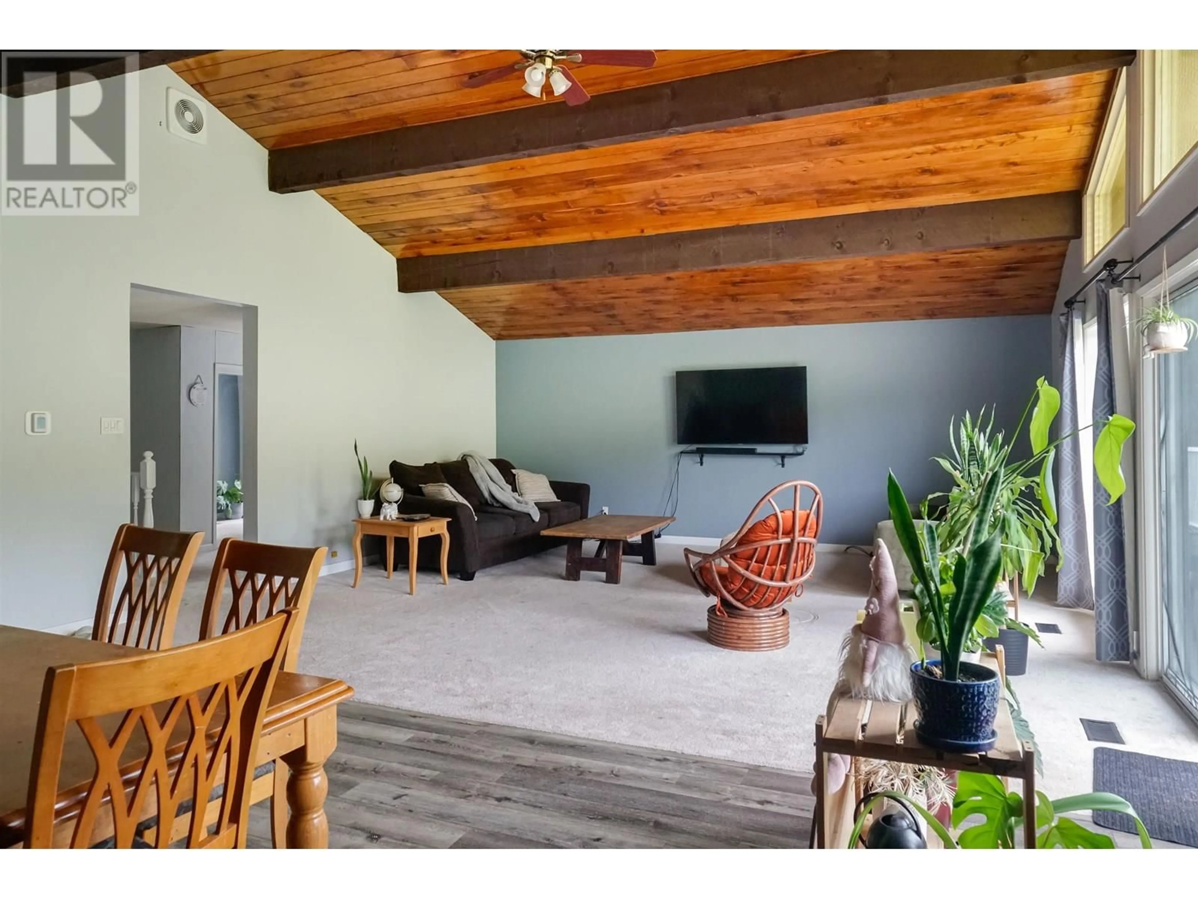 Living room with furniture, wood/laminate floor for 2410 KRESTON STREET, Terrace British Columbia V8G0G2