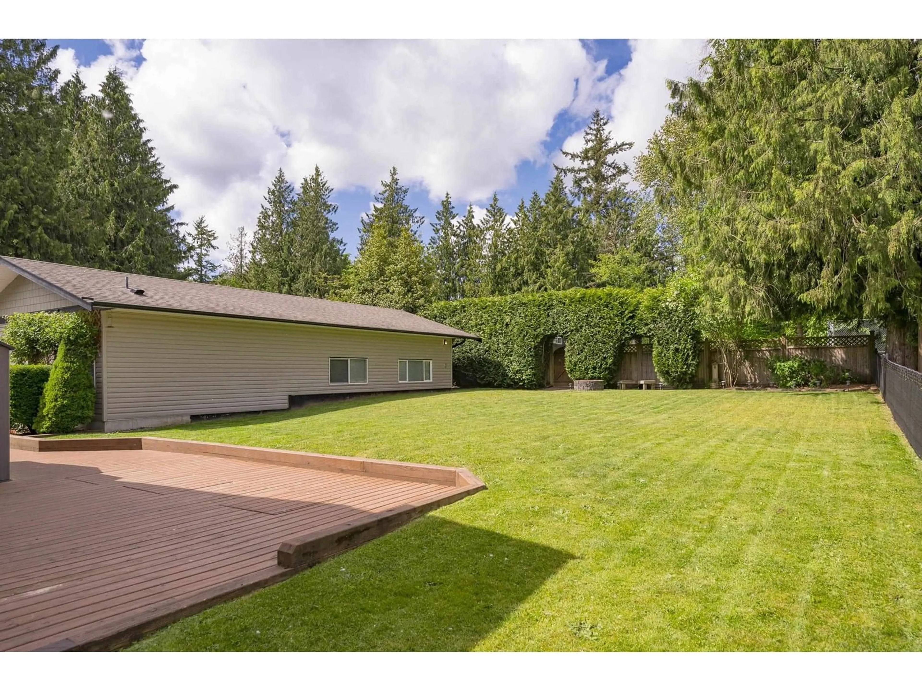 A pic from outside/outdoor area/front of a property/back of a property/a pic from drone, forest/trees view for 25035 10, Langley British Columbia V4W2S7