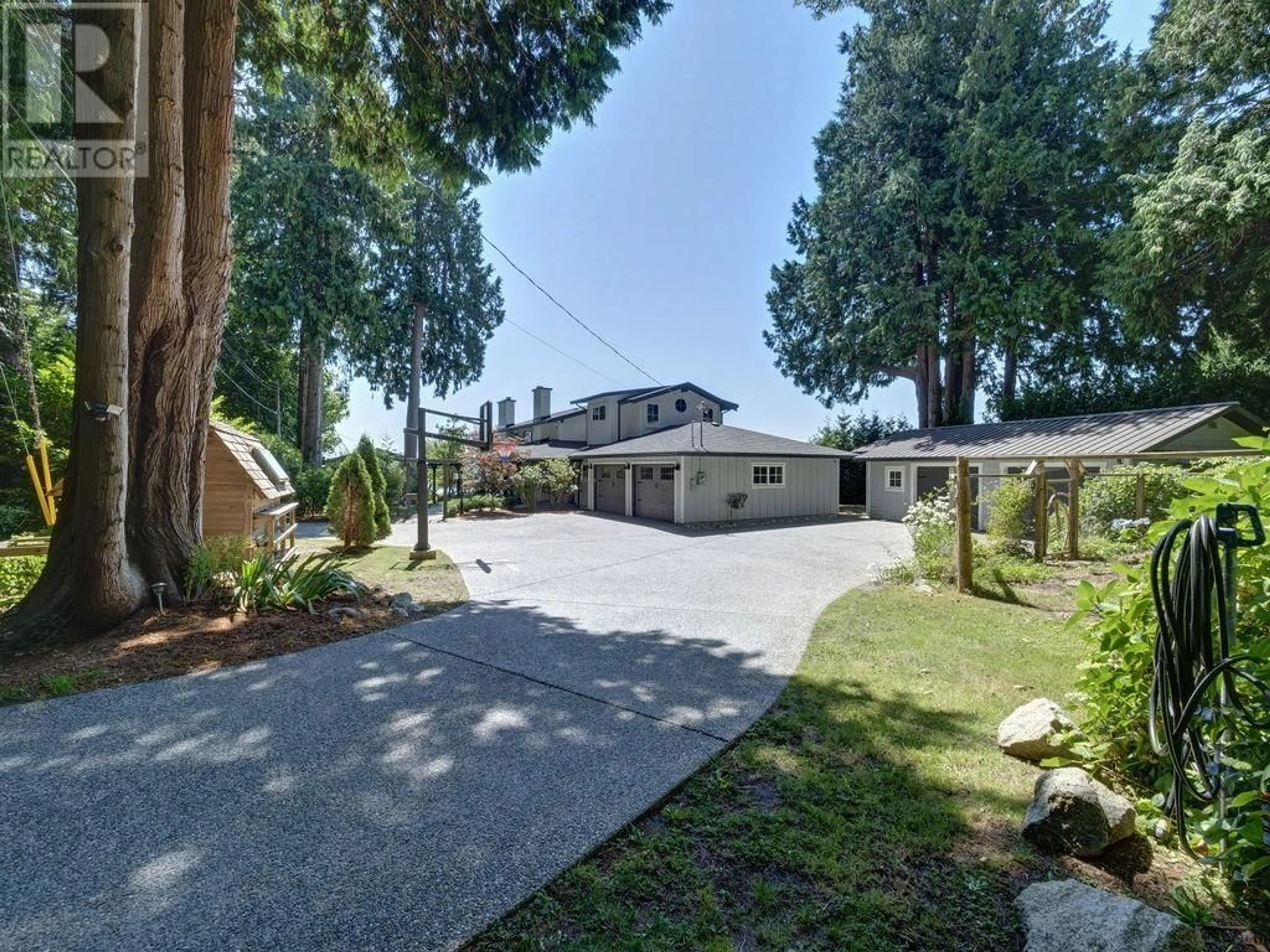 A pic from outside/outdoor area/front of a property/back of a property/a pic from drone, unknown for 3177 BEACH AVENUE, Roberts Creek British Columbia V0N2W2