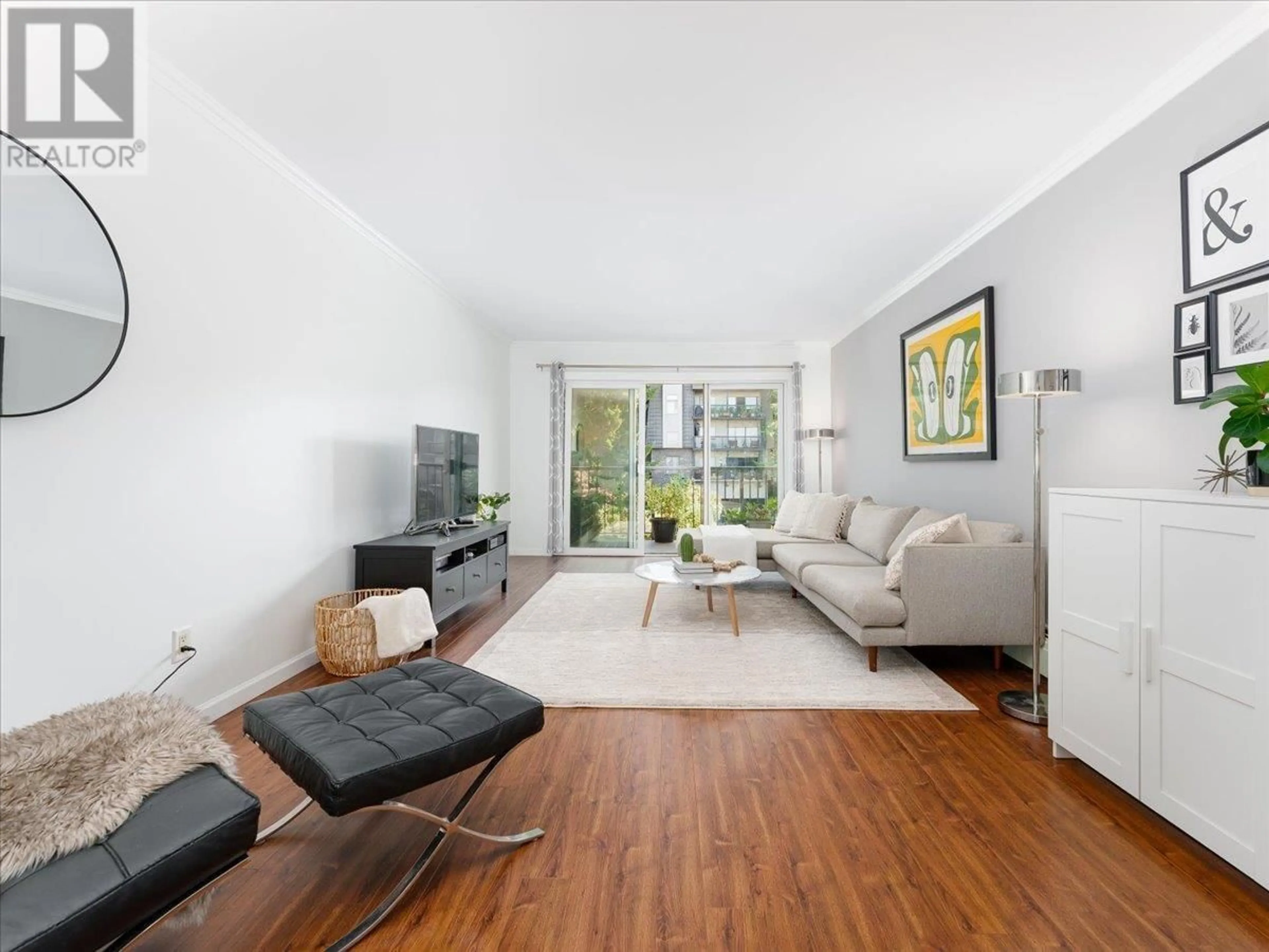 Living room with furniture, unknown for 301 - 155 5TH STREET, North Vancouver British Columbia V7L1L3