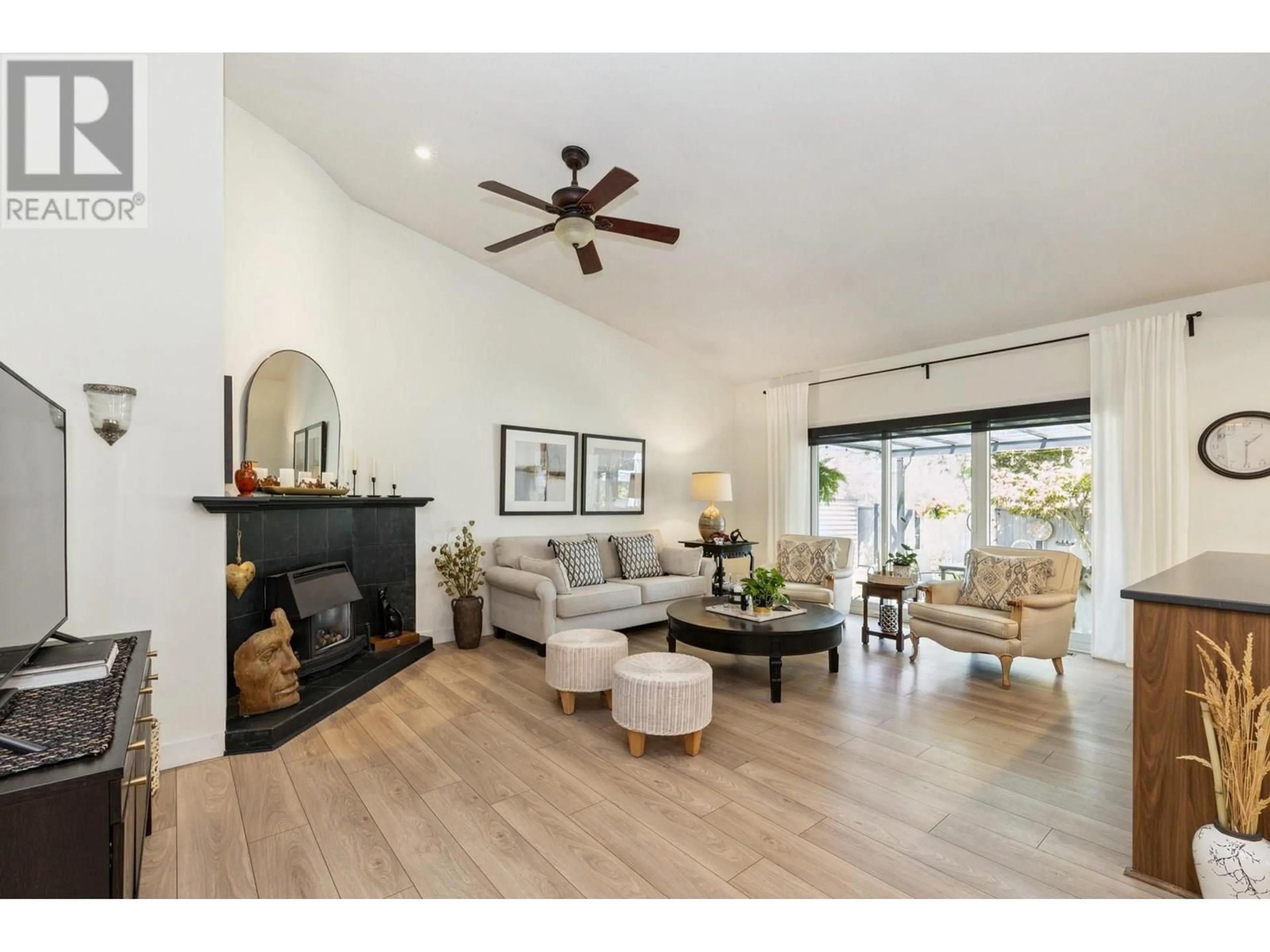 Living room with furniture, wood/laminate floor for 19590 SOMERSET DRIVE, Pitt Meadows British Columbia V3Y2L4
