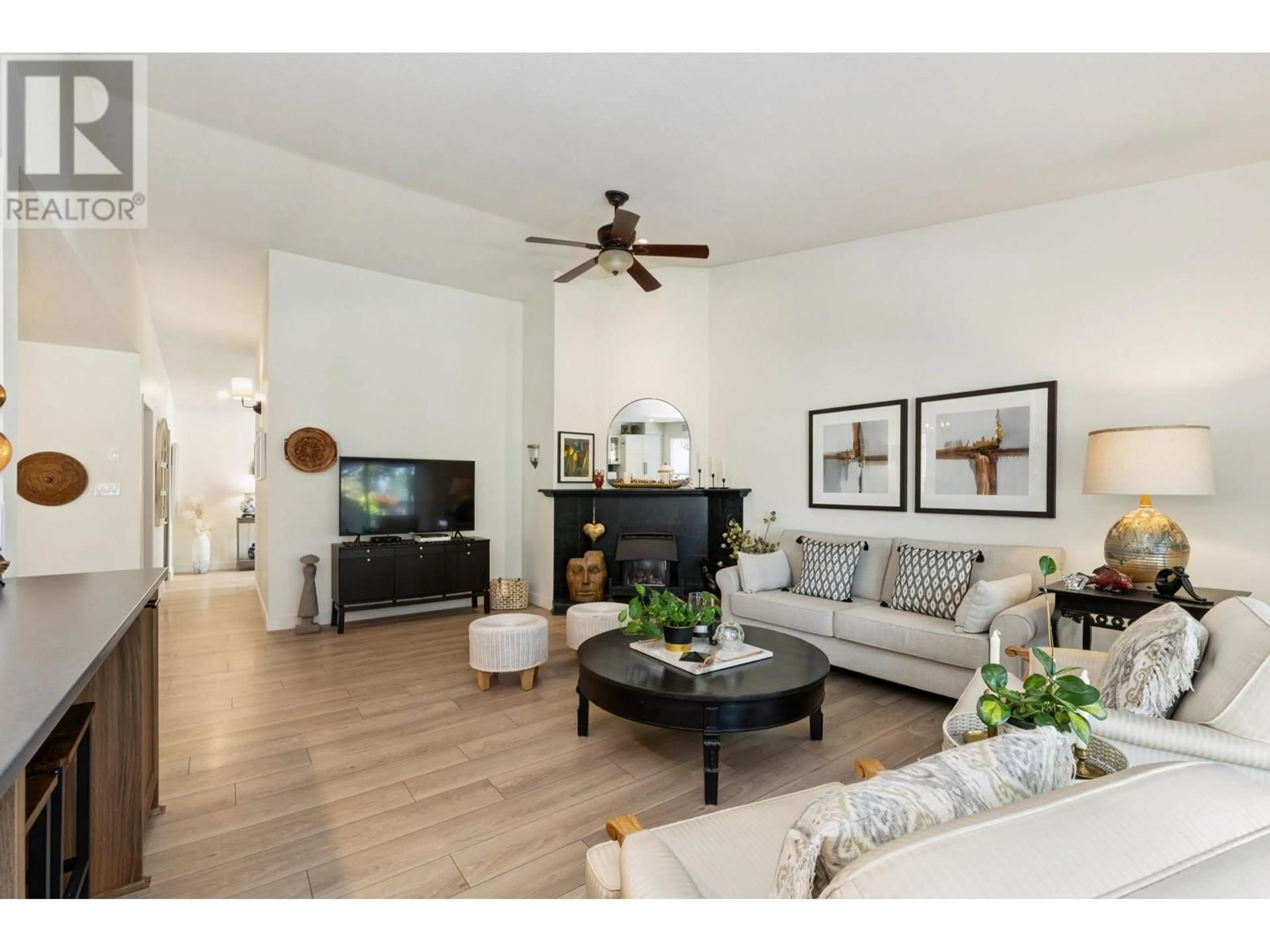 Living room with furniture, wood/laminate floor for 19590 SOMERSET DRIVE, Pitt Meadows British Columbia V3Y2L4