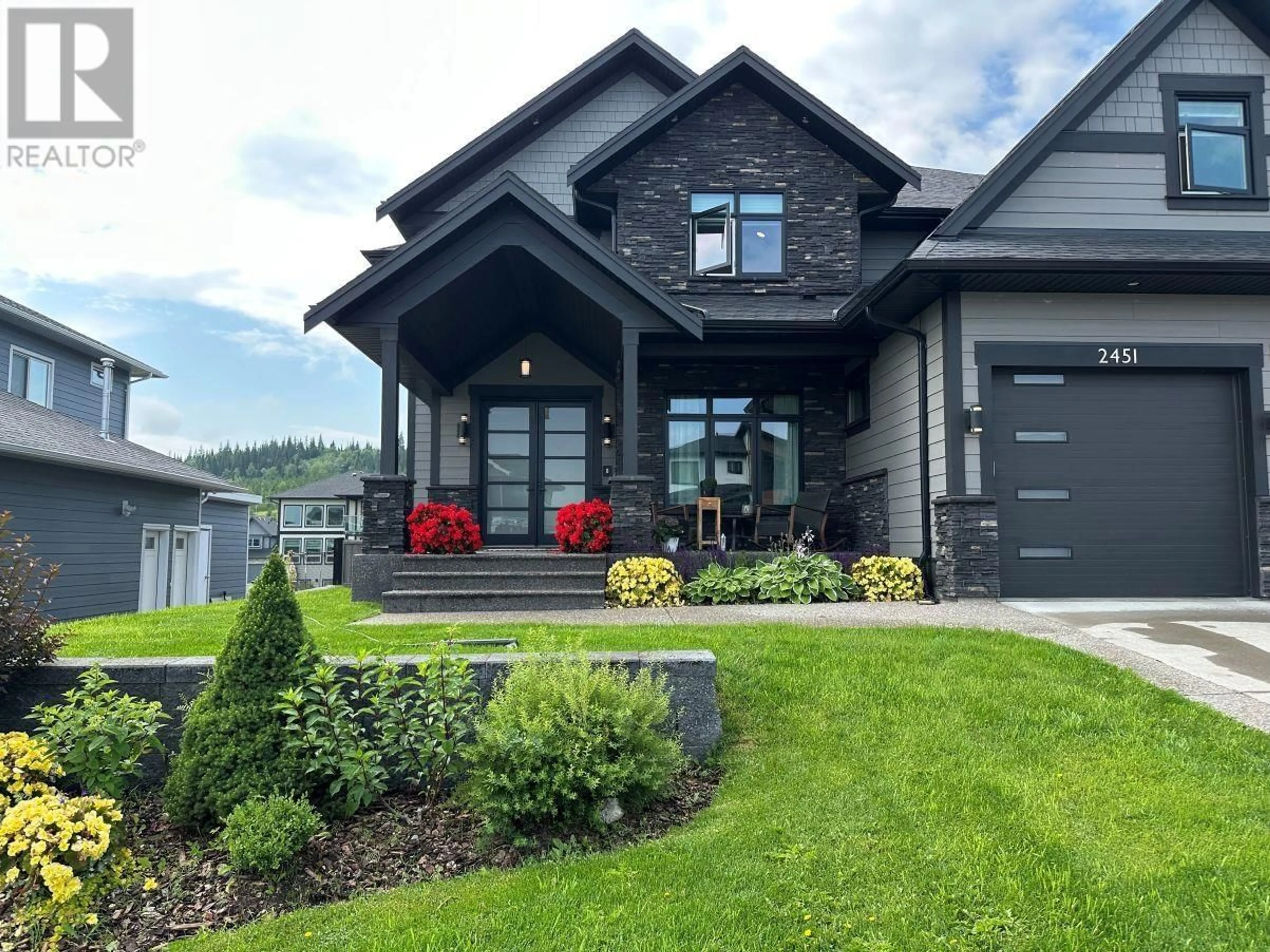 Home with brick exterior material, mountain view for 2451 GRAFTON PLACE, Prince George British Columbia V2N0E6