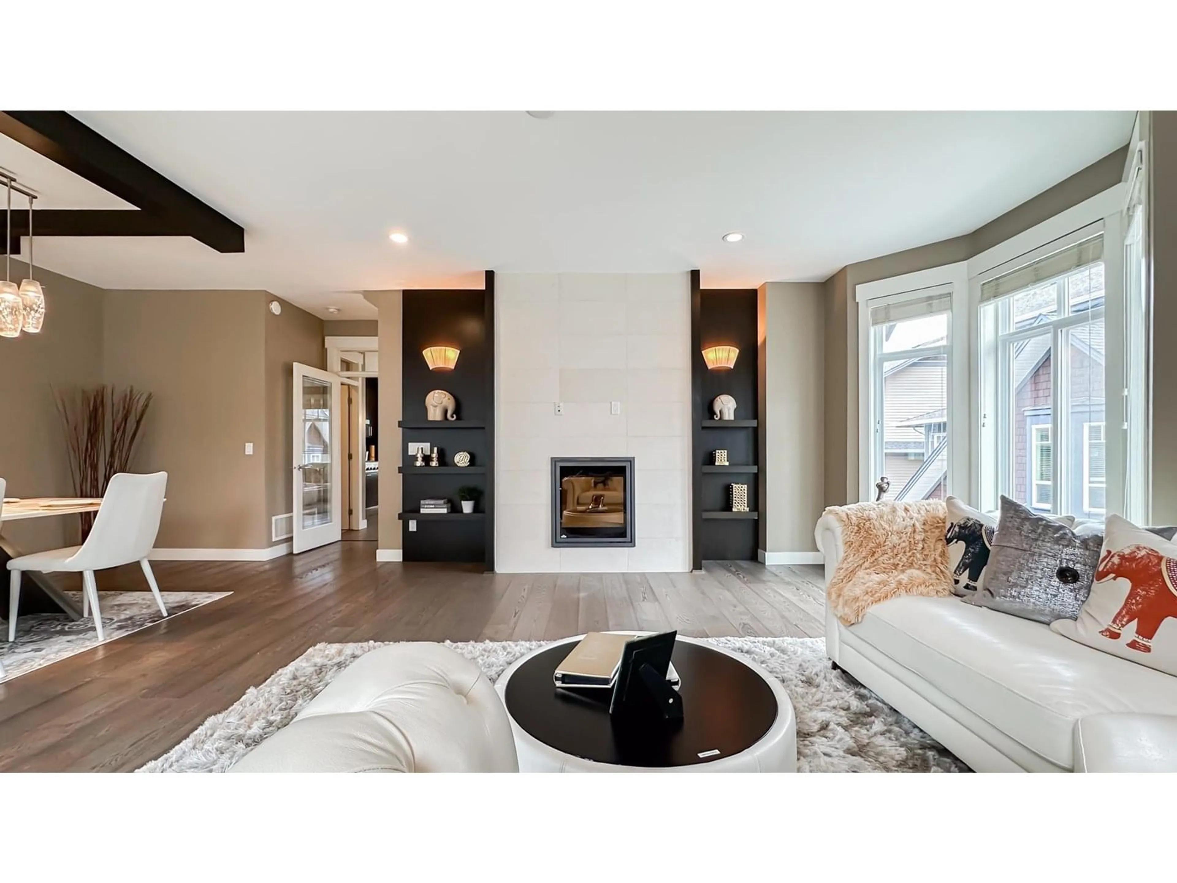 Living room with furniture, wood/laminate floor for 25 - 15977 26, Surrey British Columbia V3Z2W7