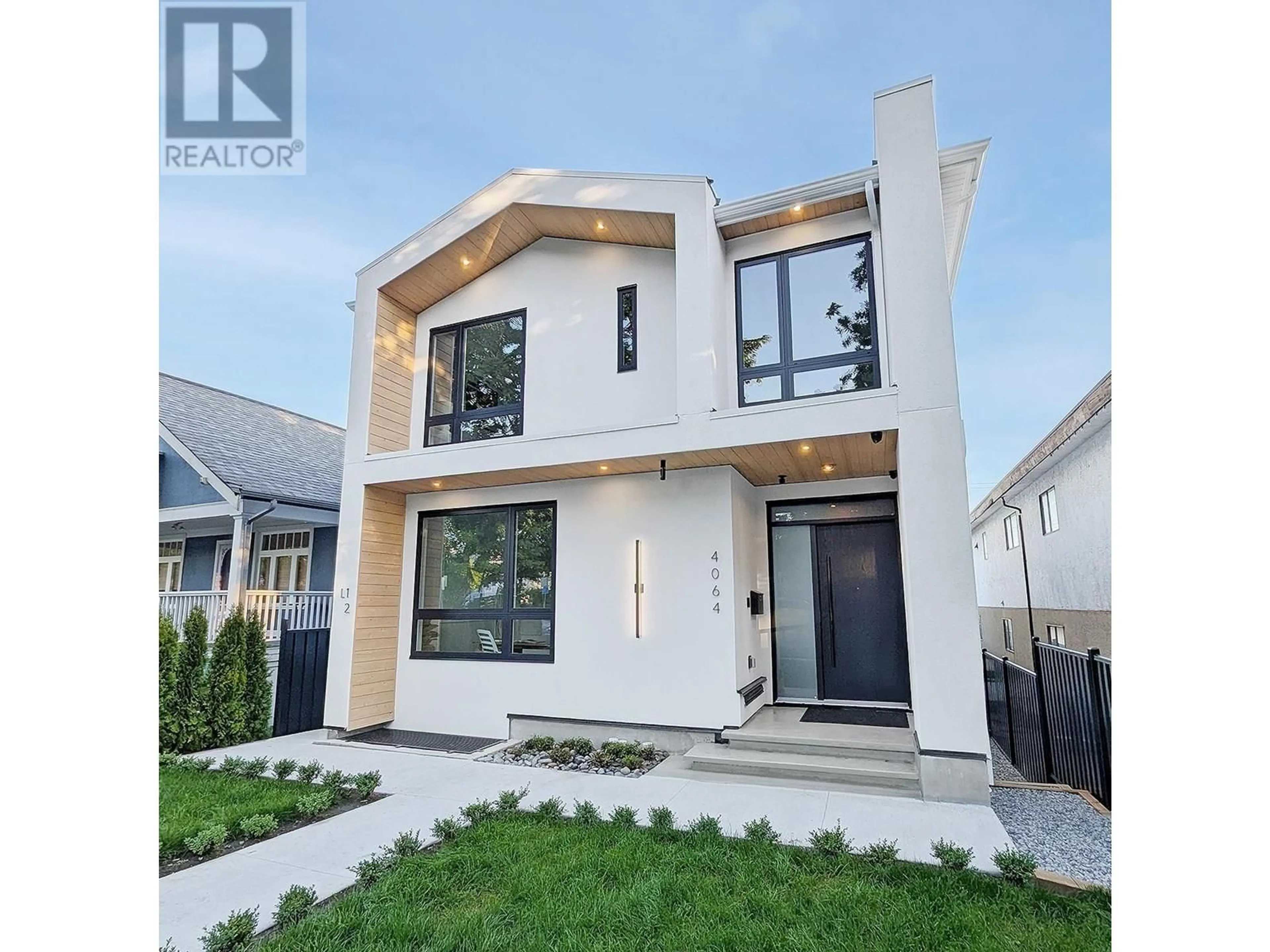 Home with vinyl exterior material, street for 4064 PENDER STREET, Burnaby British Columbia V5C2L8