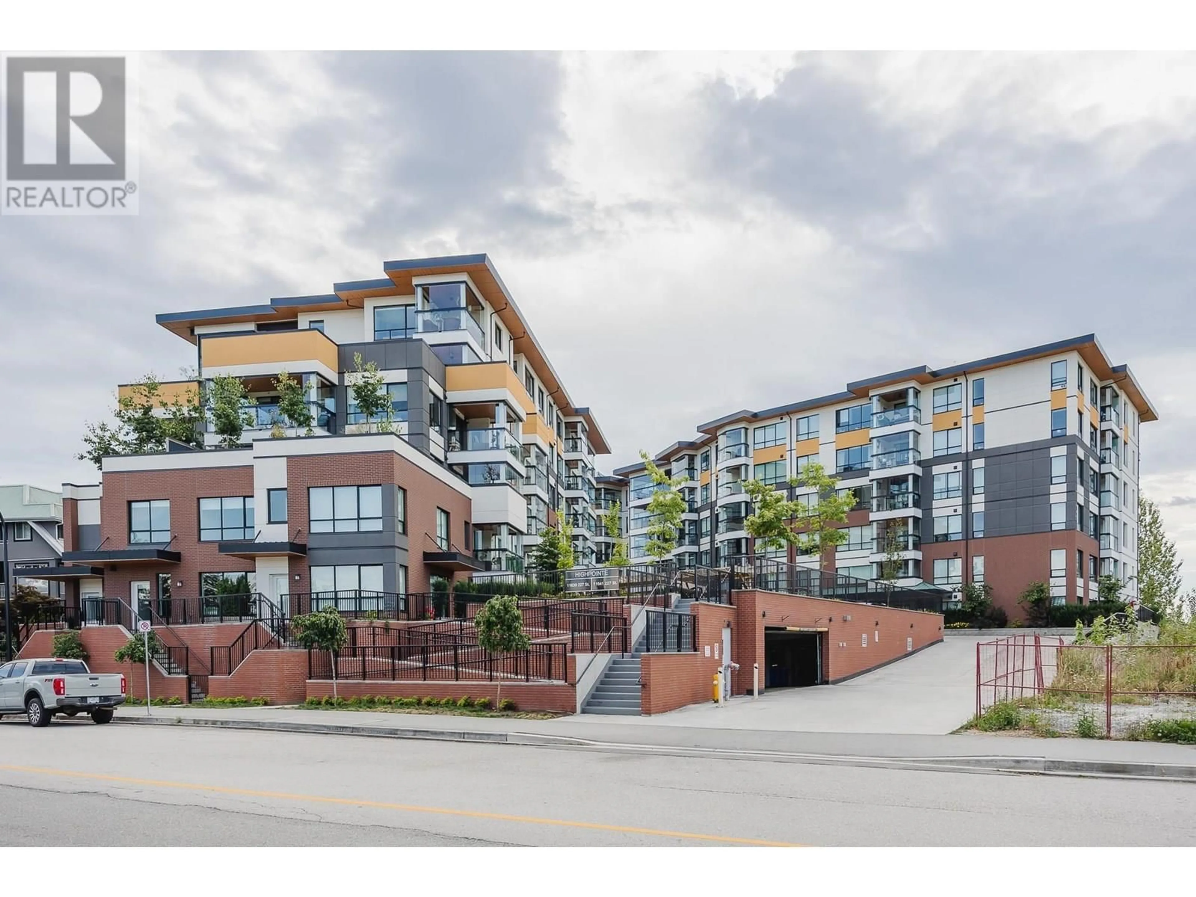 A pic from outside/outdoor area/front of a property/back of a property/a pic from drone, street for 209 - 11641 227 STREET, Maple Ridge British Columbia V2X9J6
