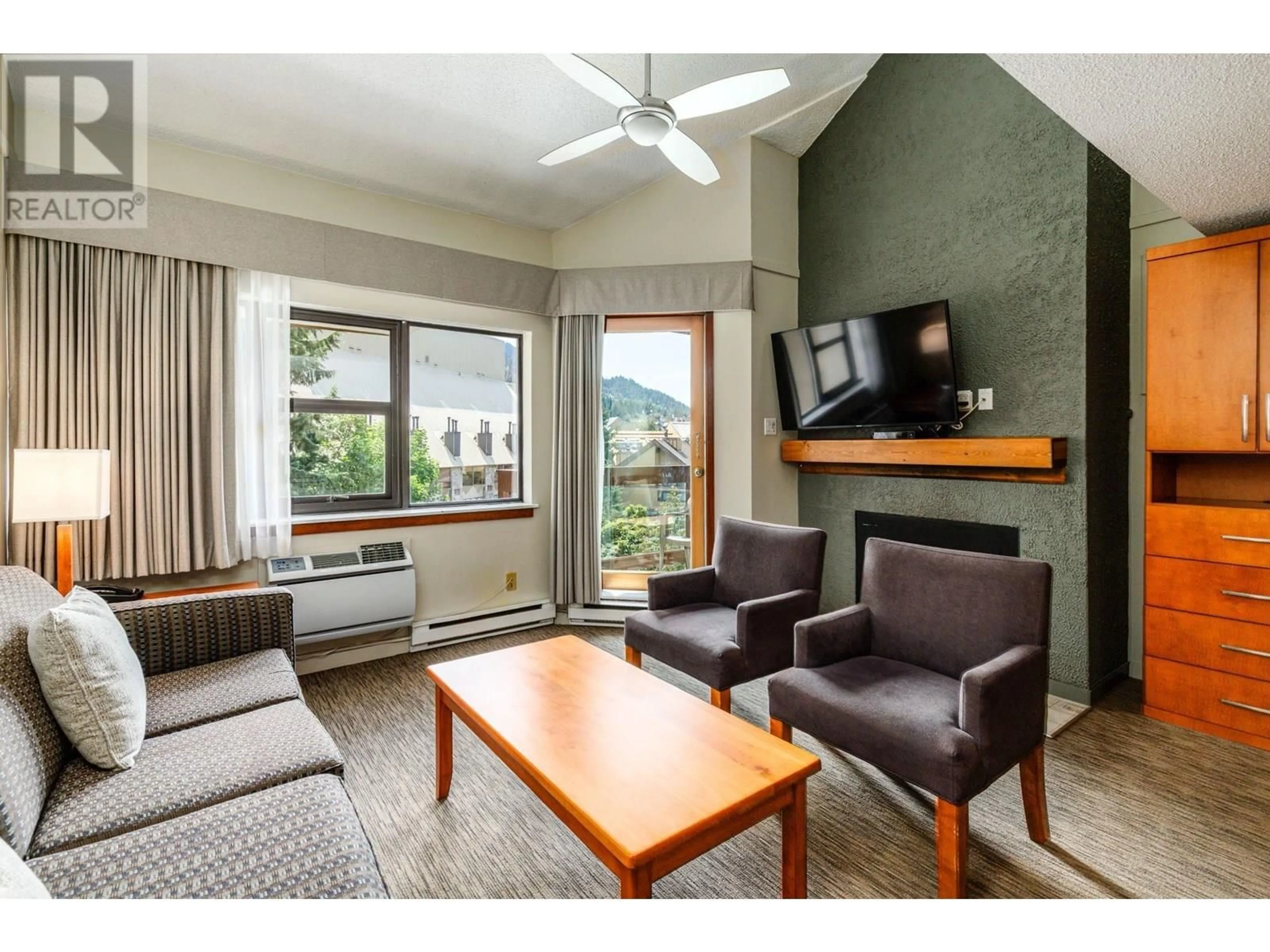 Living room with furniture, wood/laminate floor for 362 - 4429 SUNDIAL PLACE, Whistler British Columbia V8E1G8