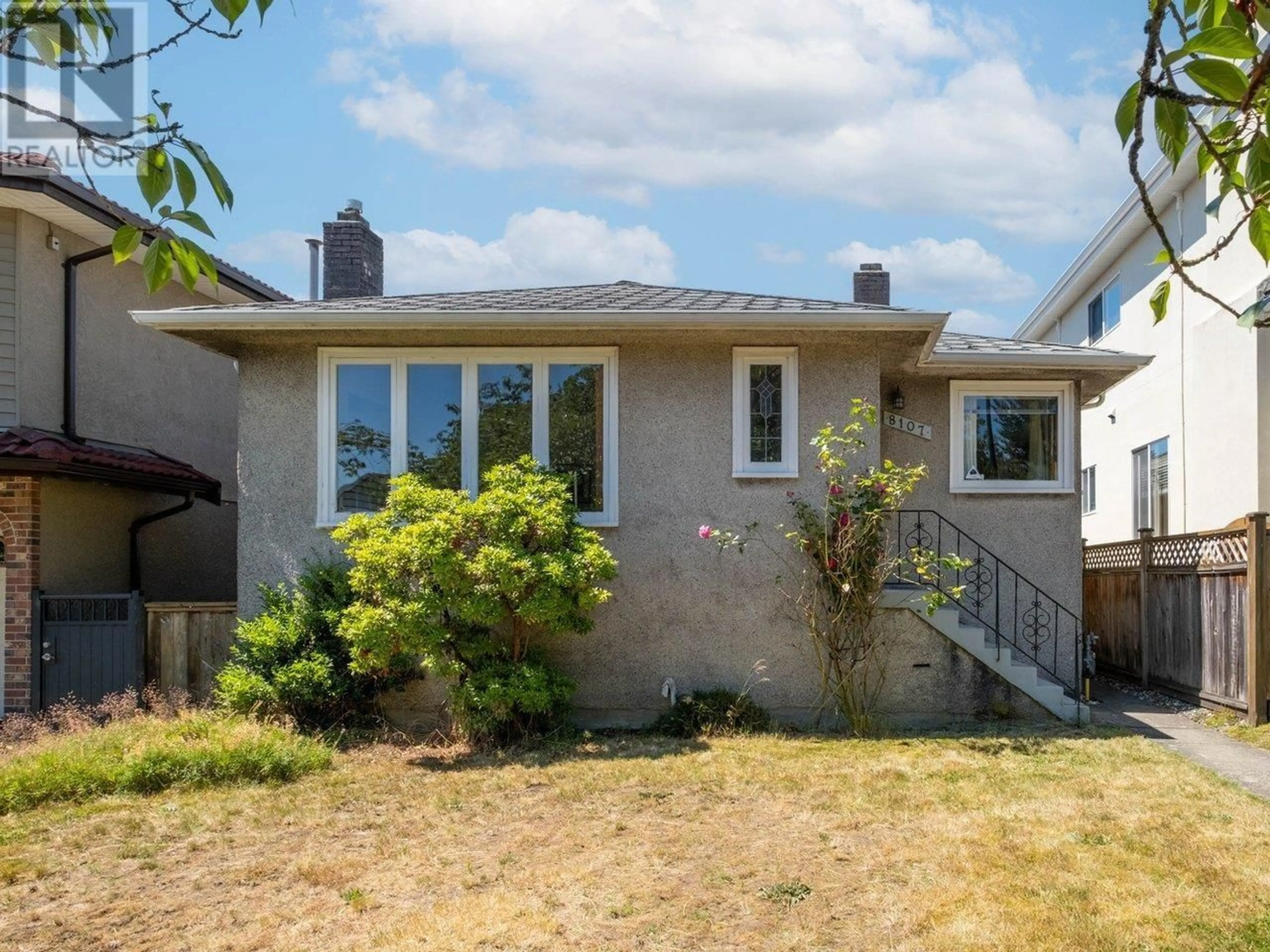 Home with vinyl exterior material, street for 8107 OSLER STREET, Vancouver British Columbia V6P4E3