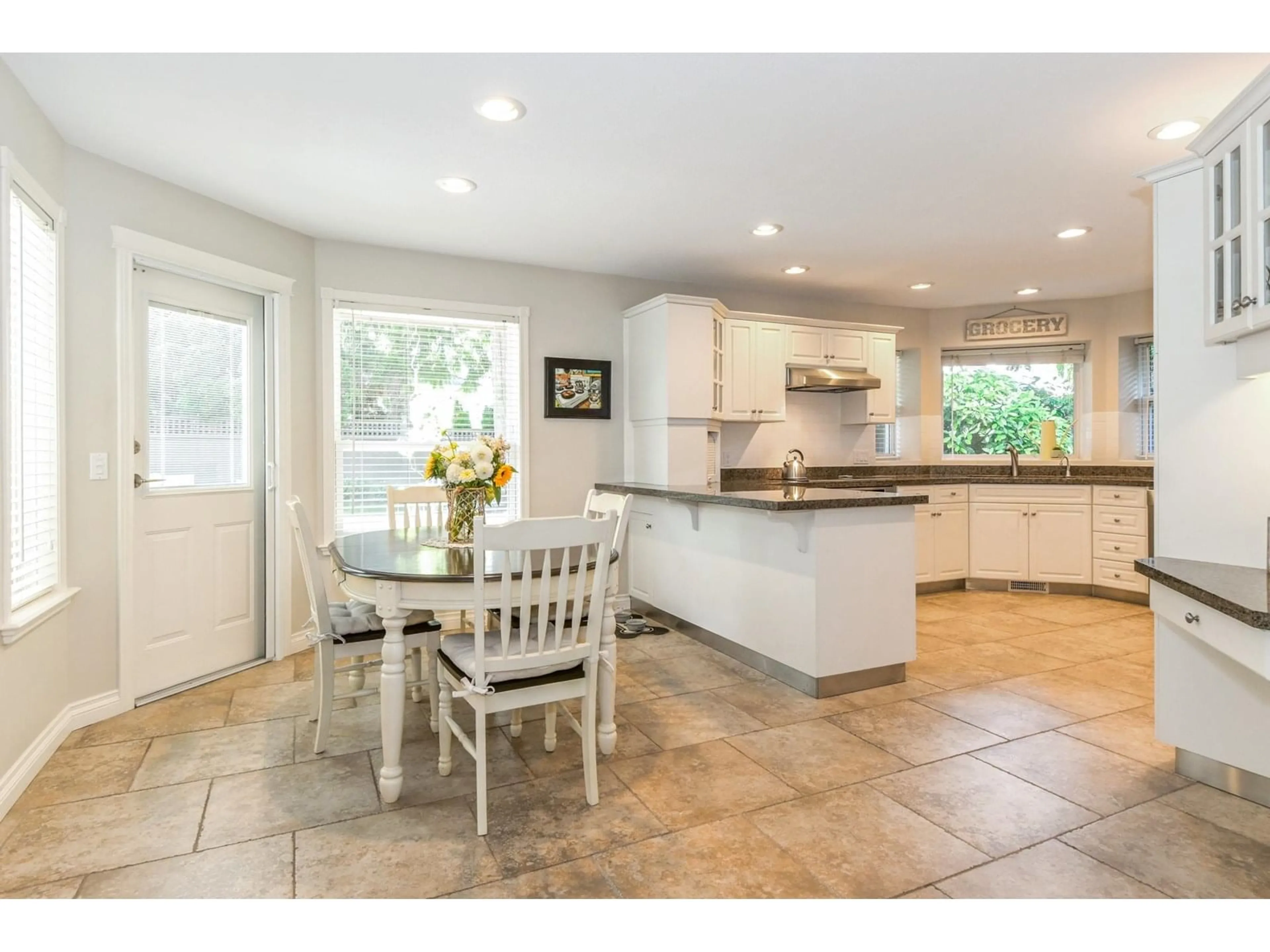 Open concept kitchen, ceramic/tile floor for 21920 46A, Langley British Columbia V3A8J3