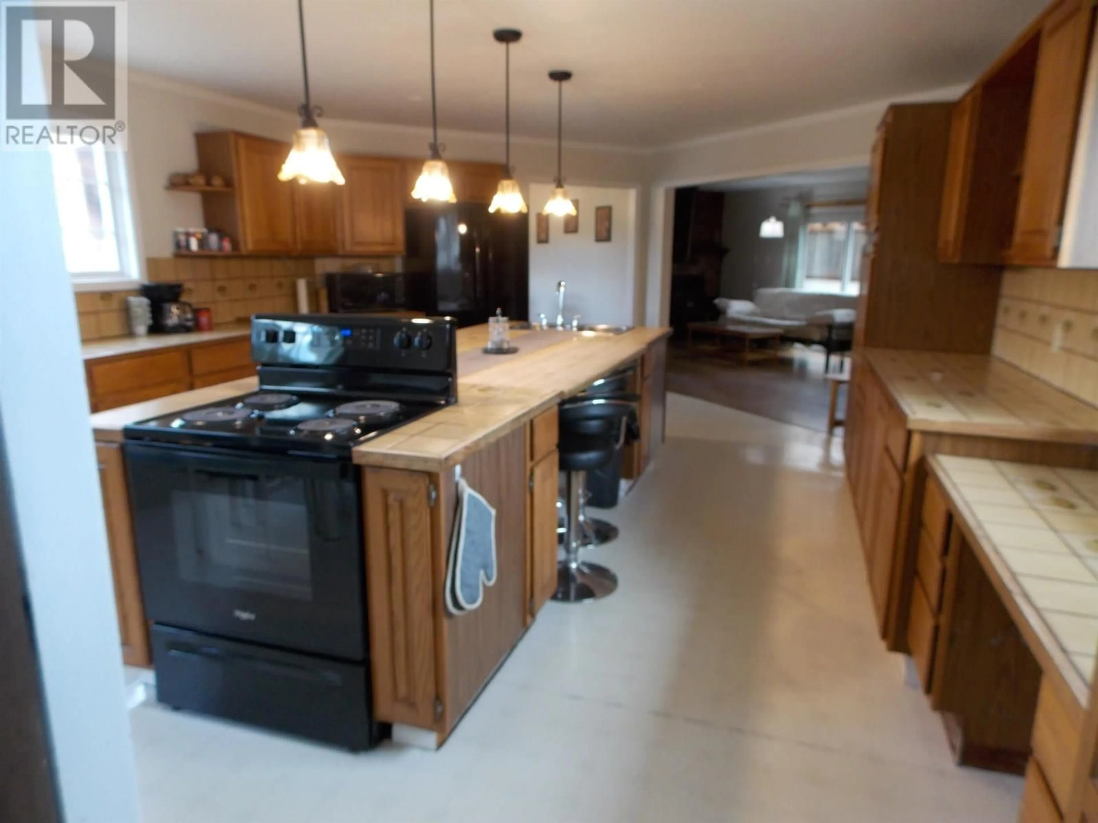 Open concept kitchen, ceramic/tile floor for 5343 NITHI ROAD, Fraser Lake British Columbia V0J1S0