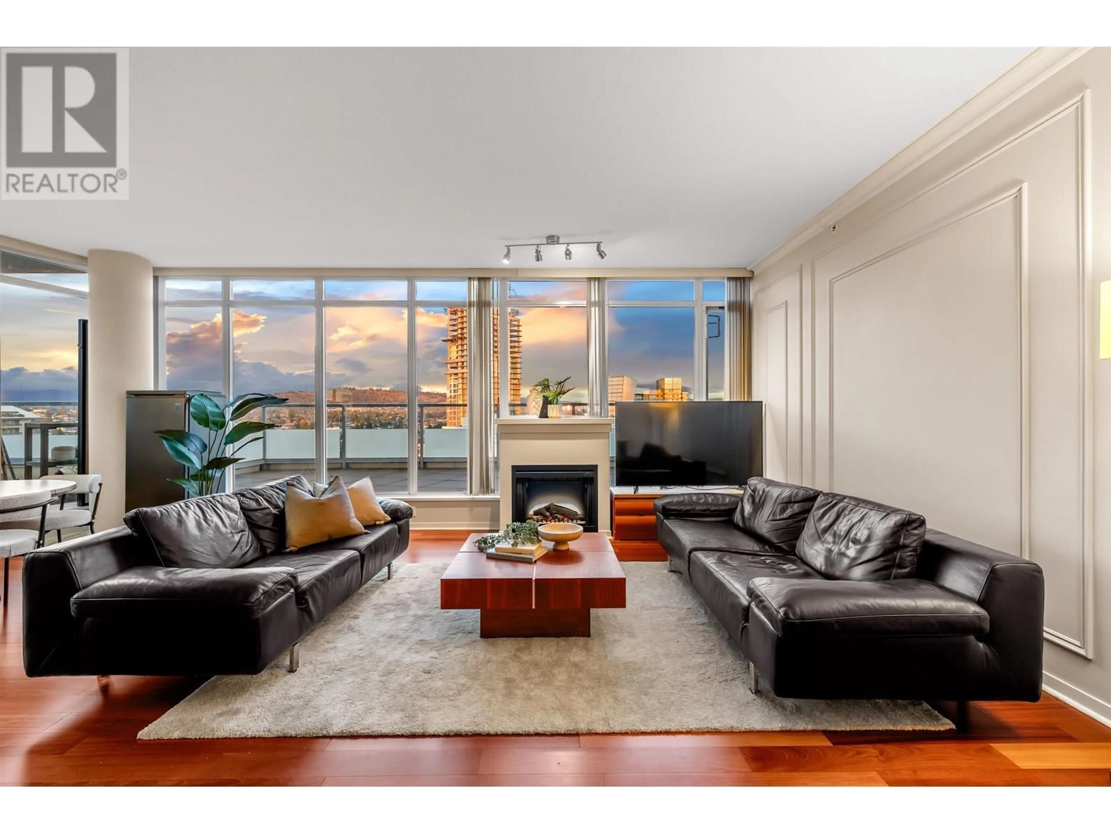 Living room with furniture, wood/laminate floor for 3103 - 2133 DOUGLAS ROAD, Burnaby British Columbia V5C0E9