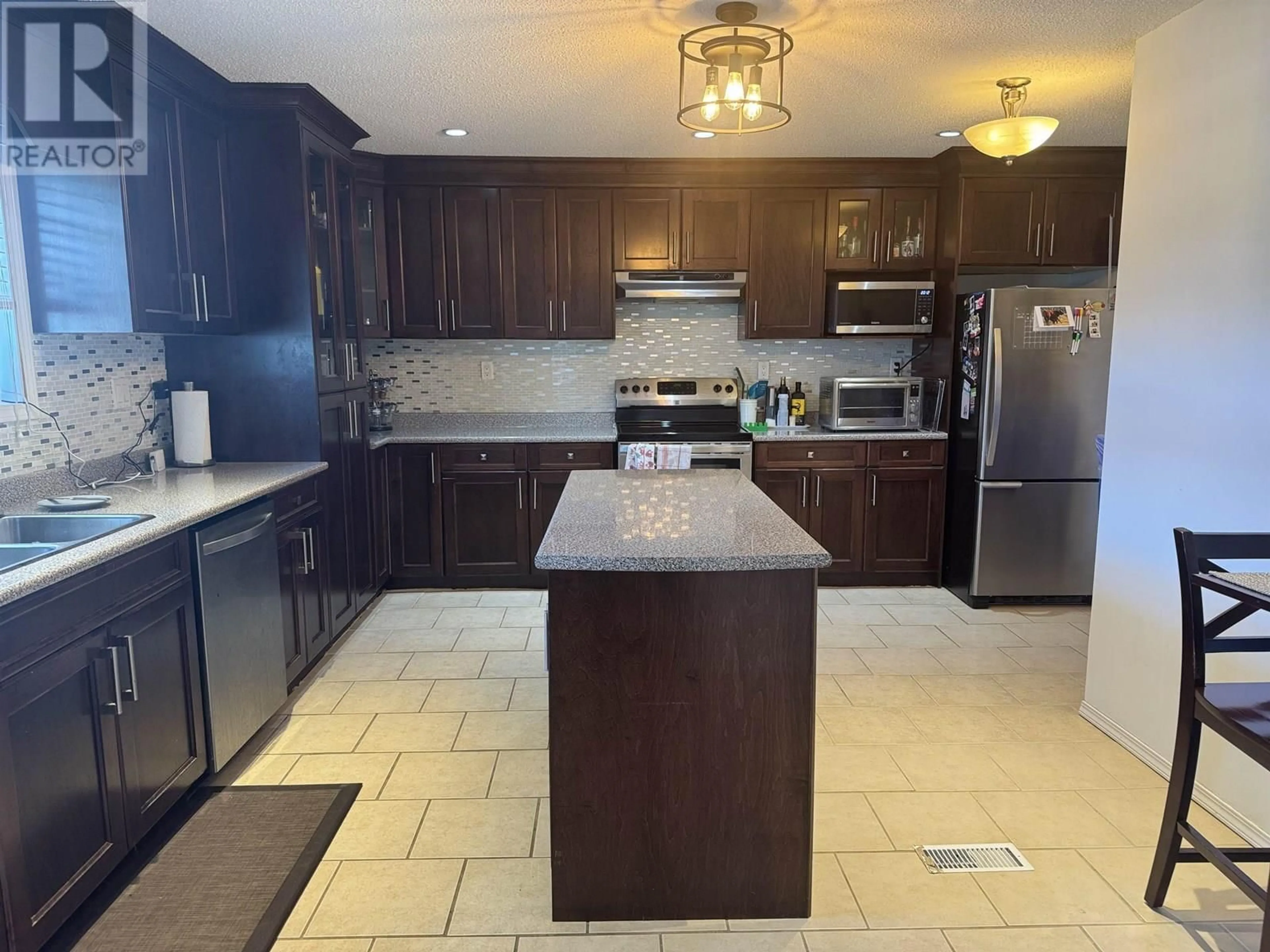 Open concept kitchen, ceramic/tile floor for 519 BABINE DRIVE, Mackenzie British Columbia V0J2C0
