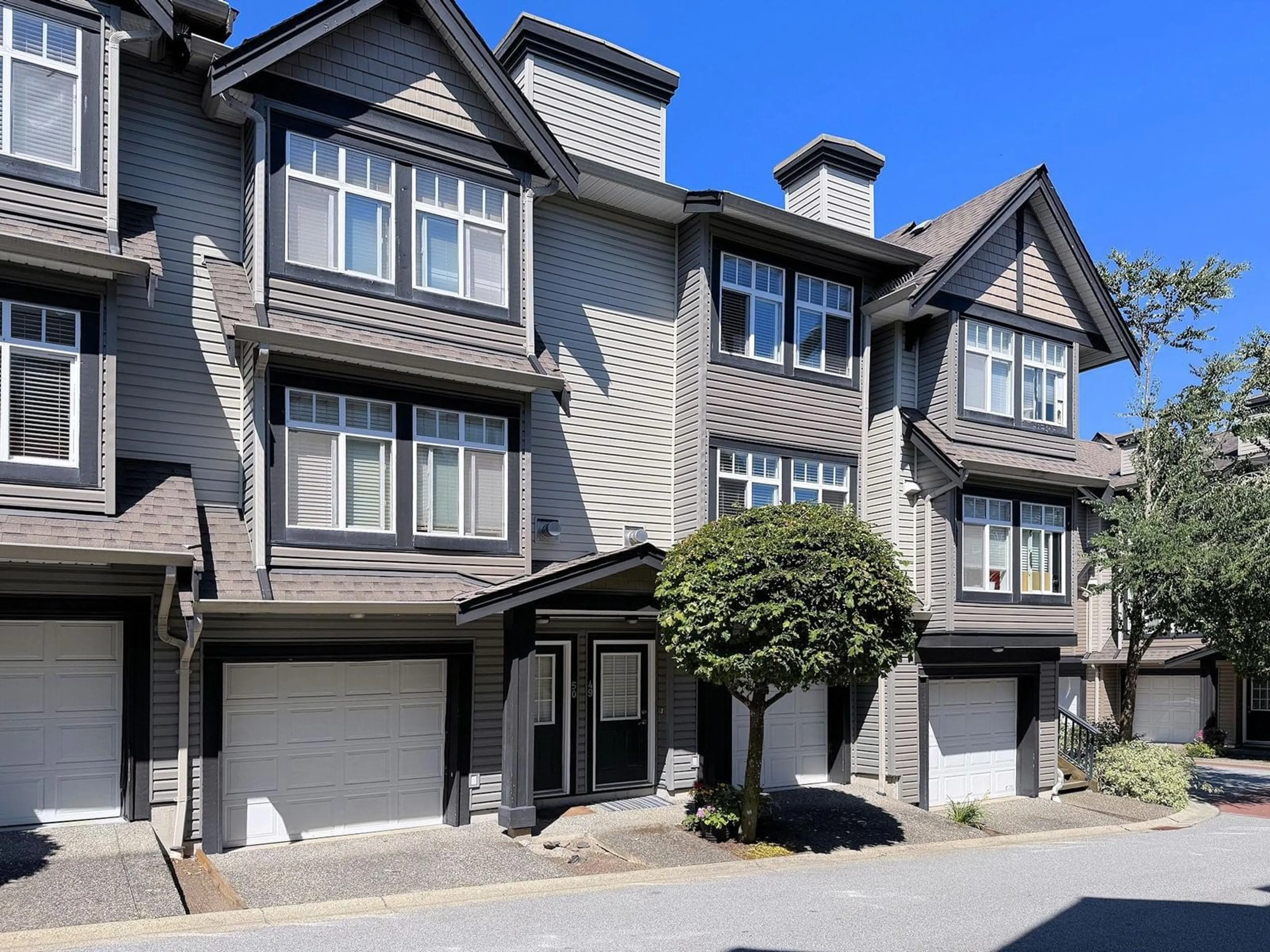 Home with vinyl exterior material, street for 49 - 19448 68, Surrey British Columbia V4N5V5