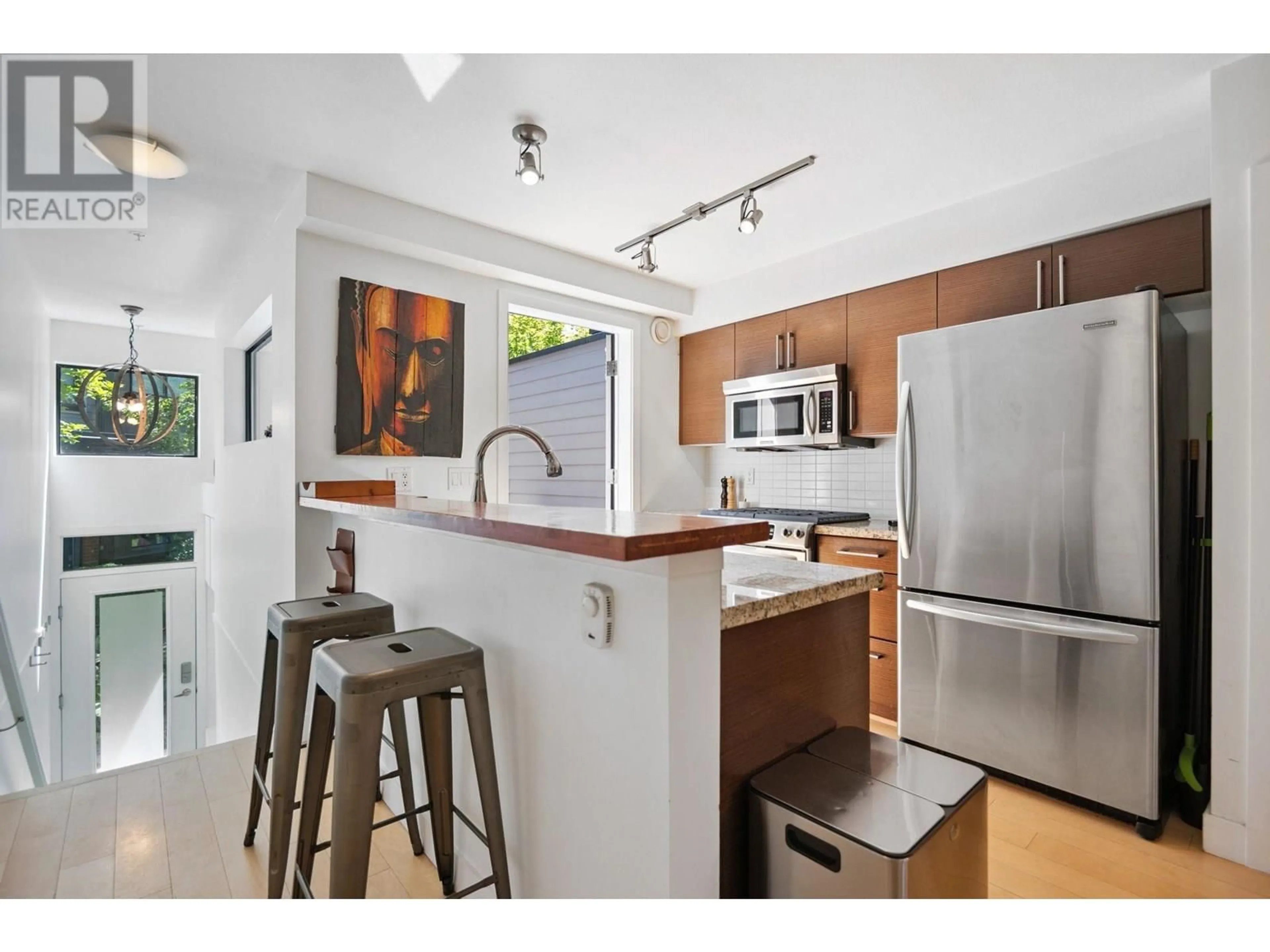 Open concept kitchen, unknown for 104 - 1855 STAINSBURY AVENUE, Vancouver British Columbia V5N2M6