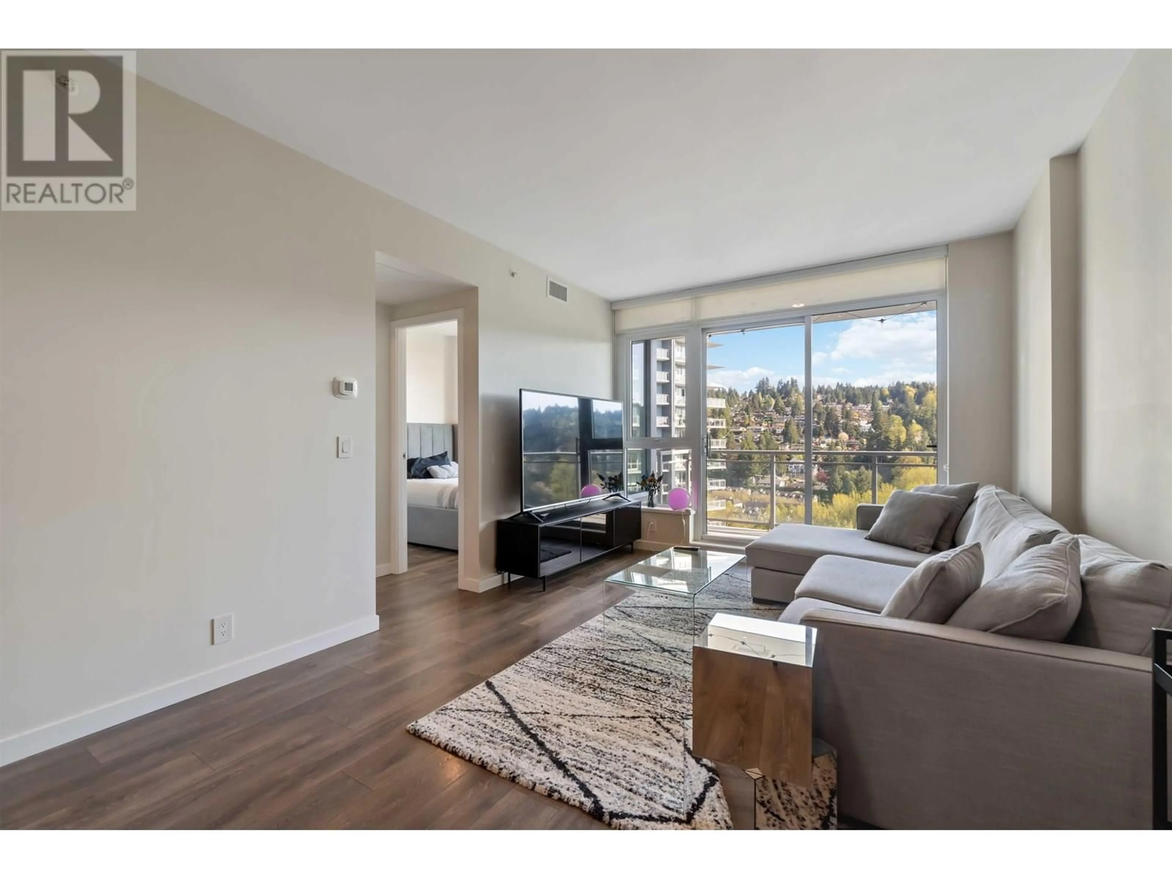 Living room with furniture, wood/laminate floor for 2005 - 305 MORRISSEY ROAD, Port Moody British Columbia V3H0M3