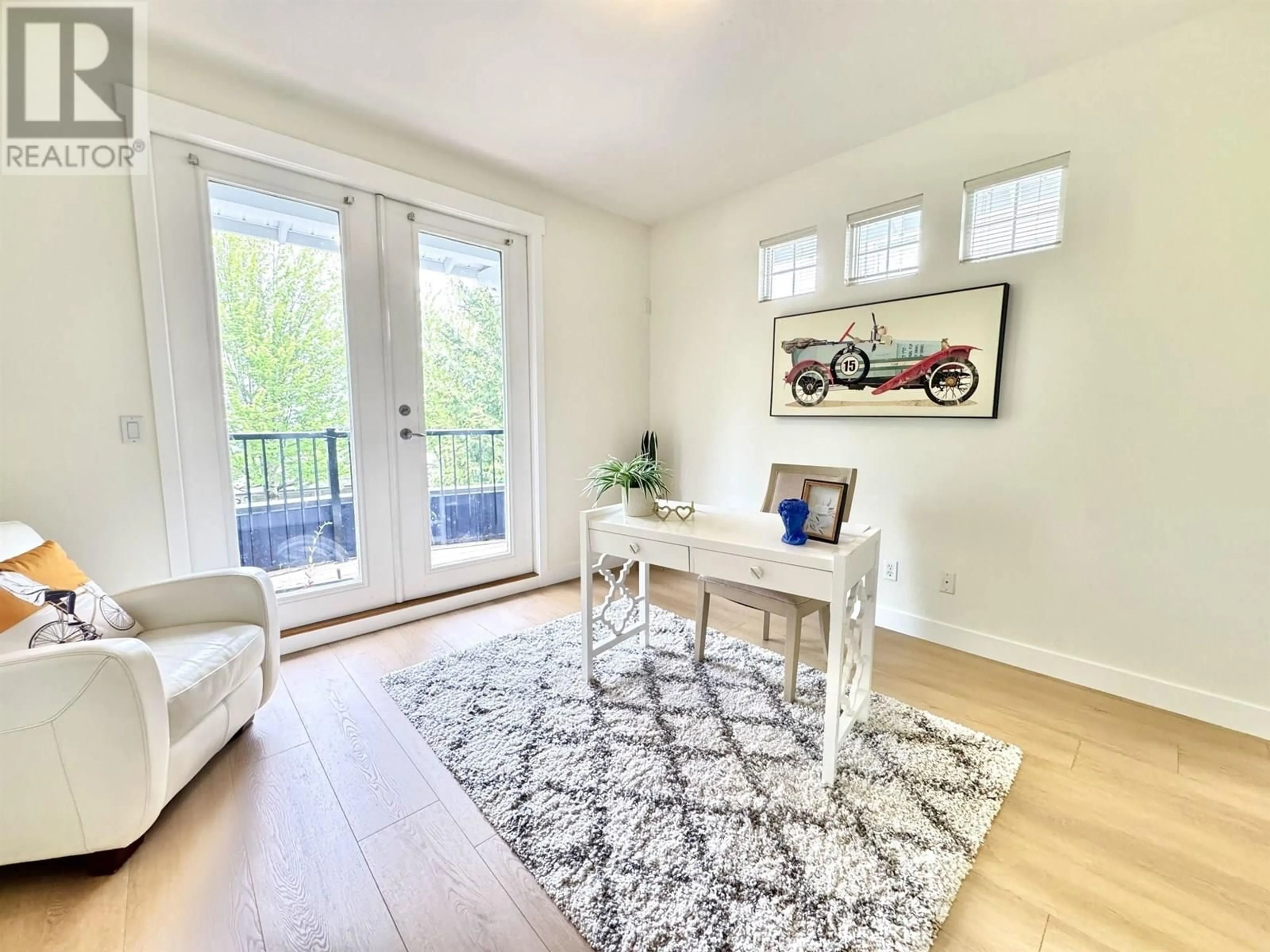 Living room with furniture, wood/laminate floor for 99 MAPLE DRIVE, Port Moody British Columbia V3E2Y2