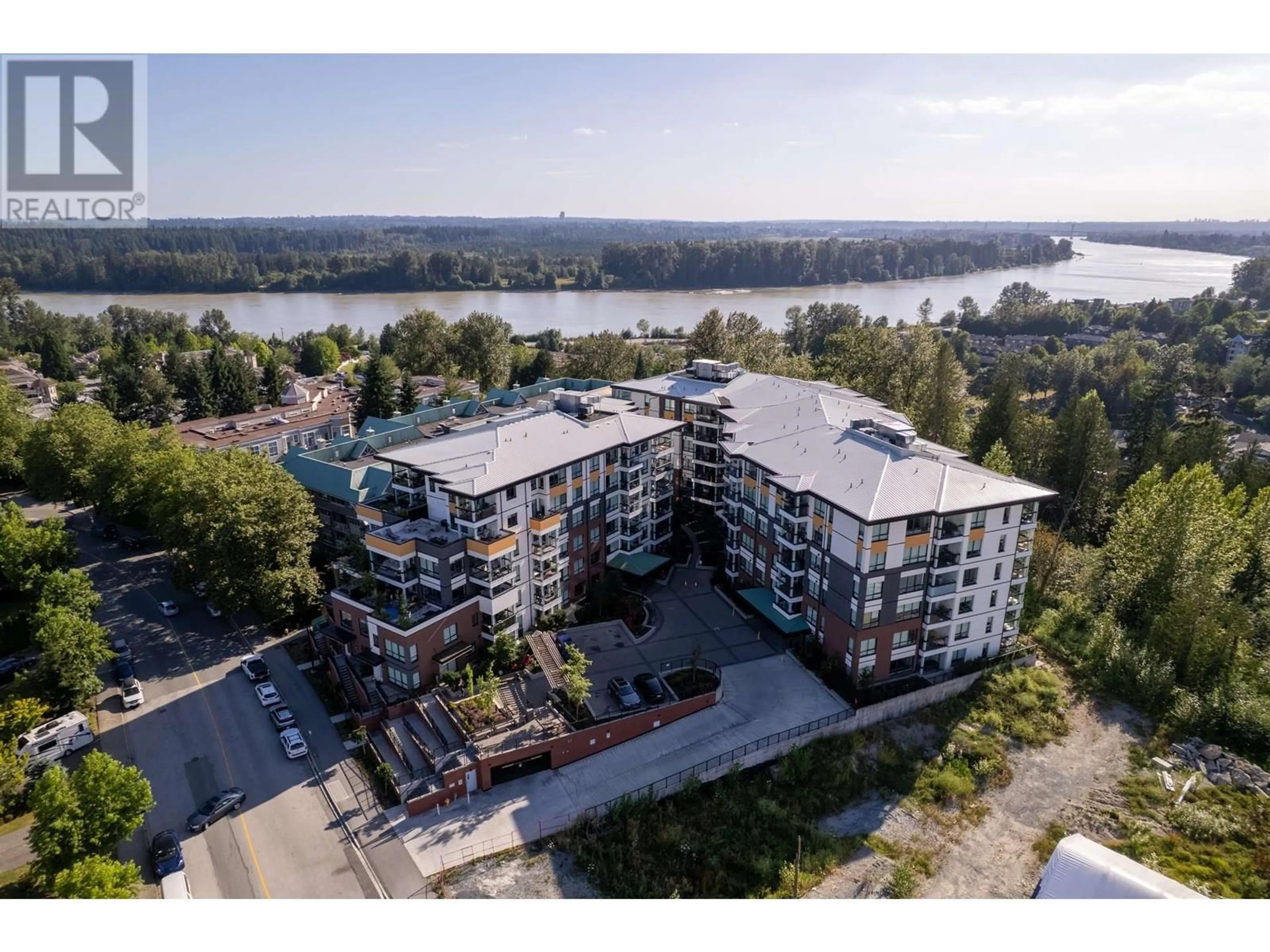 A pic from outside/outdoor area/front of a property/back of a property/a pic from drone, water/lake/river/ocean view for 103 - 11639 227 STREET, Maple Ridge British Columbia V2X9B2