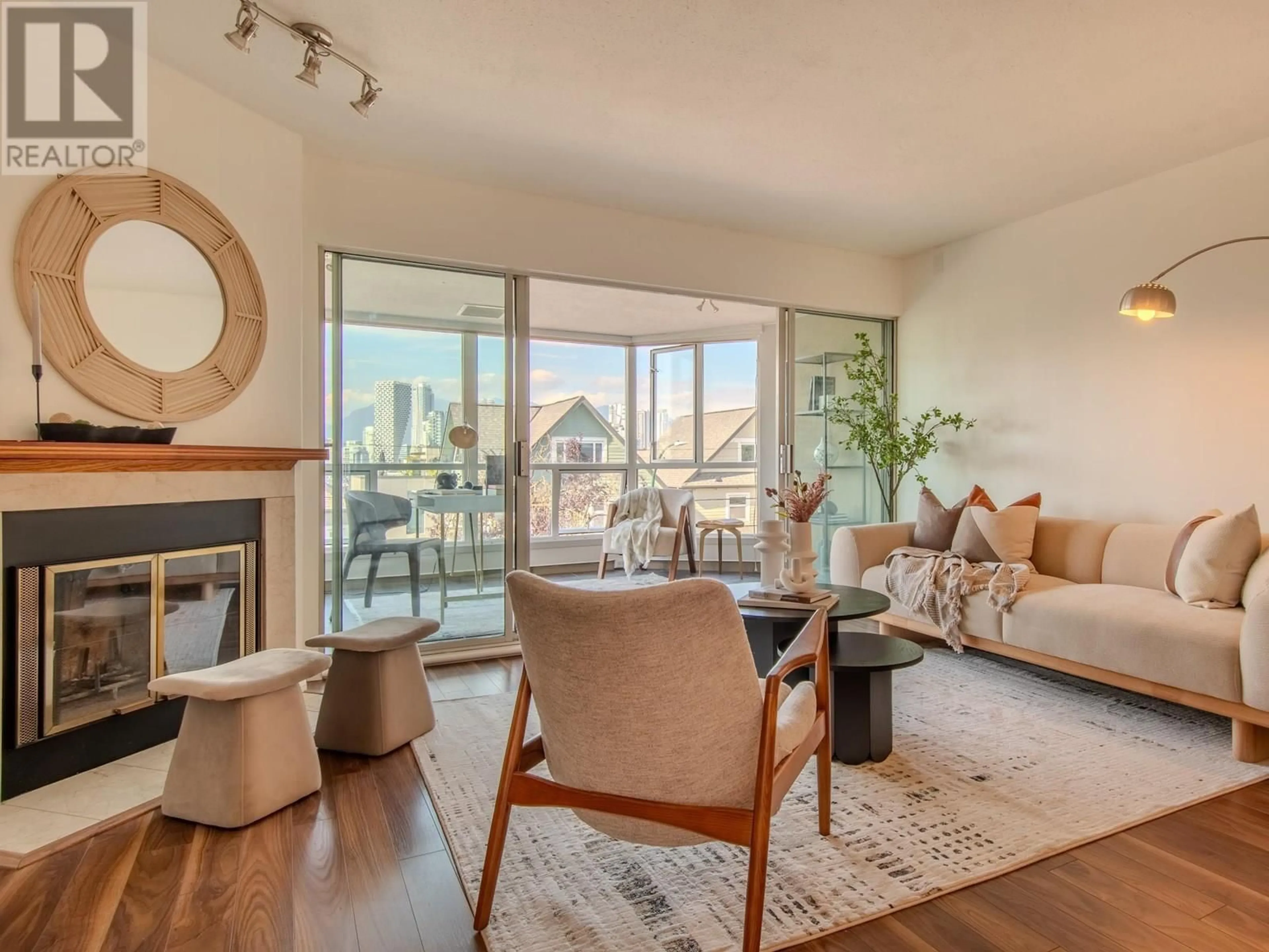 Living room with furniture, wood/laminate floor for 1296 8TH AVENUE, Vancouver British Columbia V6H3Y9