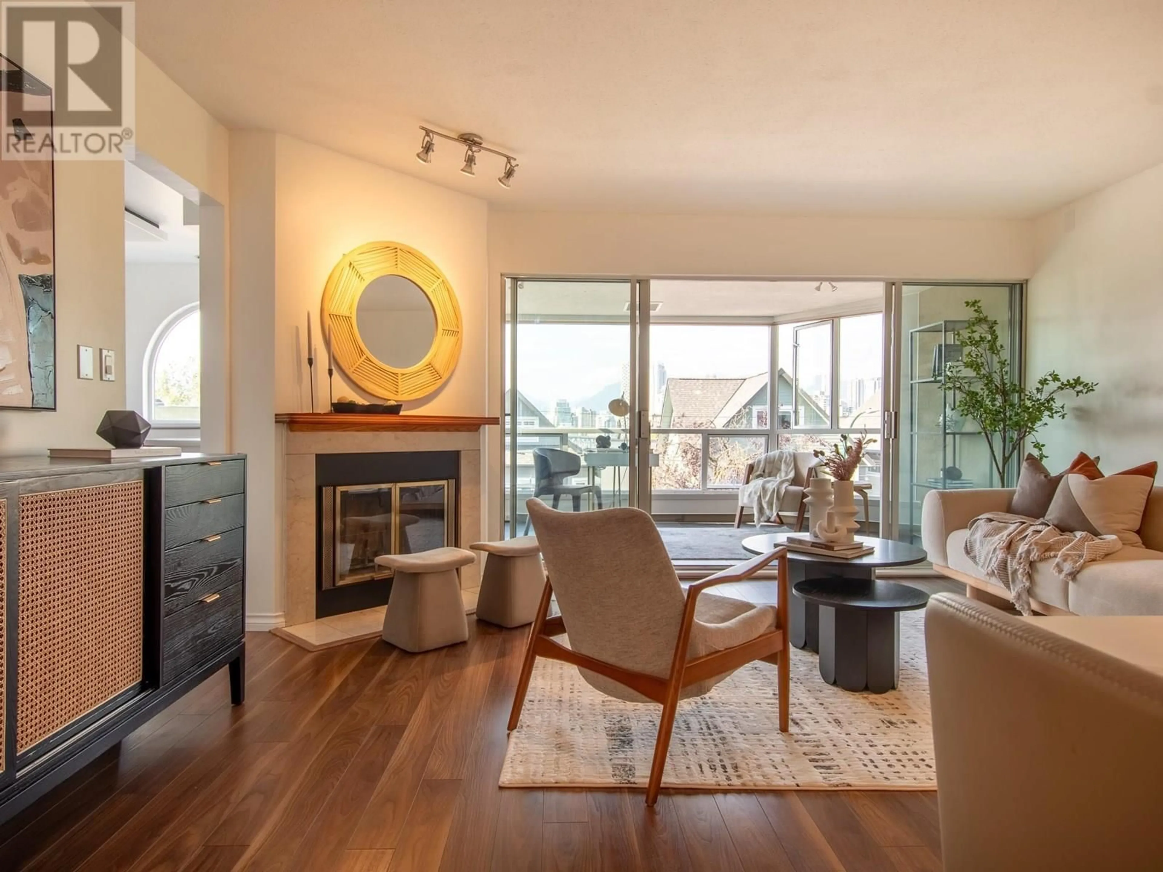Living room with furniture, wood/laminate floor for 1296 8TH AVENUE, Vancouver British Columbia V6H3Y9