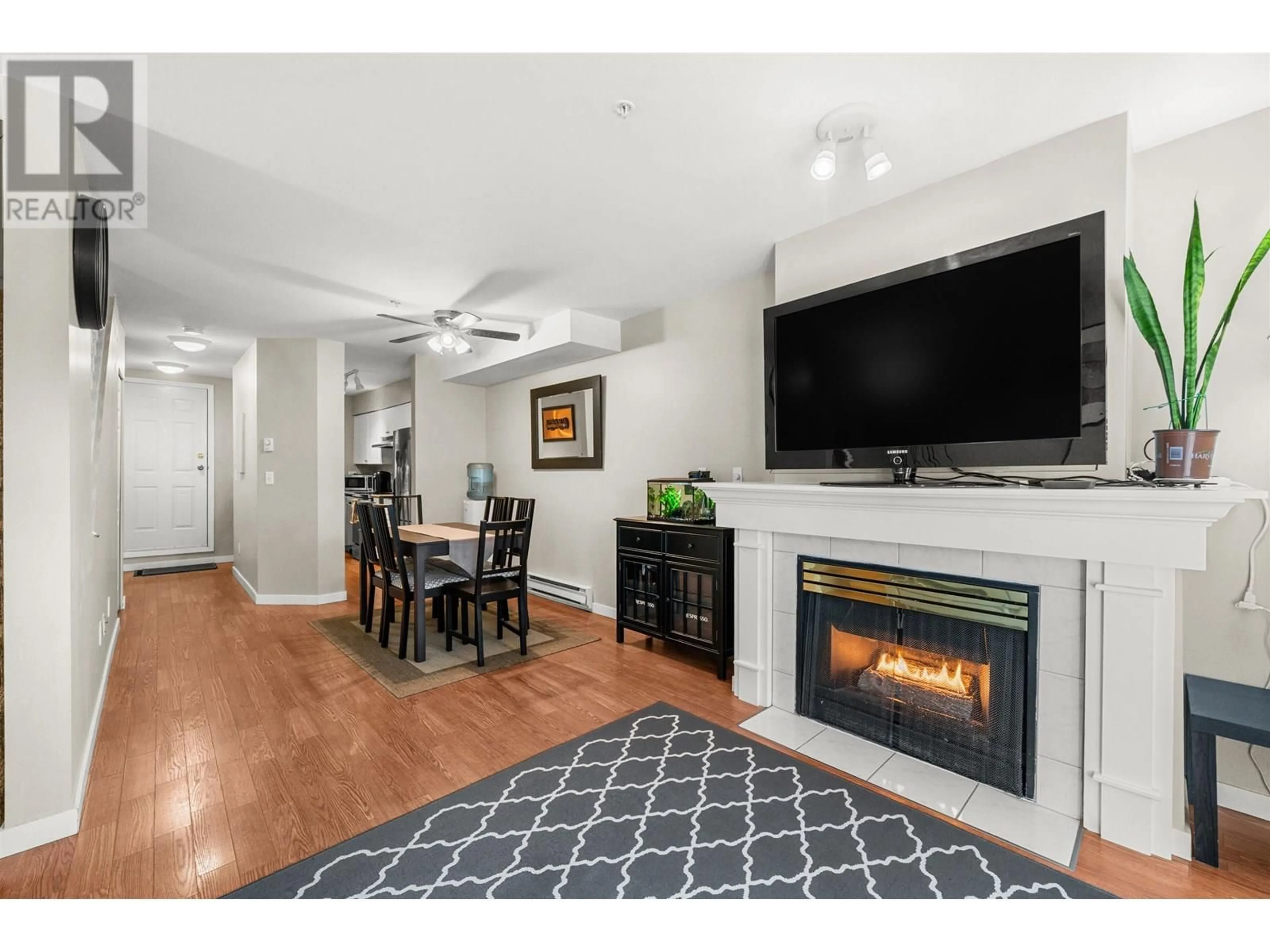 Living room with furniture, unknown for 102 - 1570 PRAIRIE AVENUE, Port Coquitlam British Columbia V3B1T4