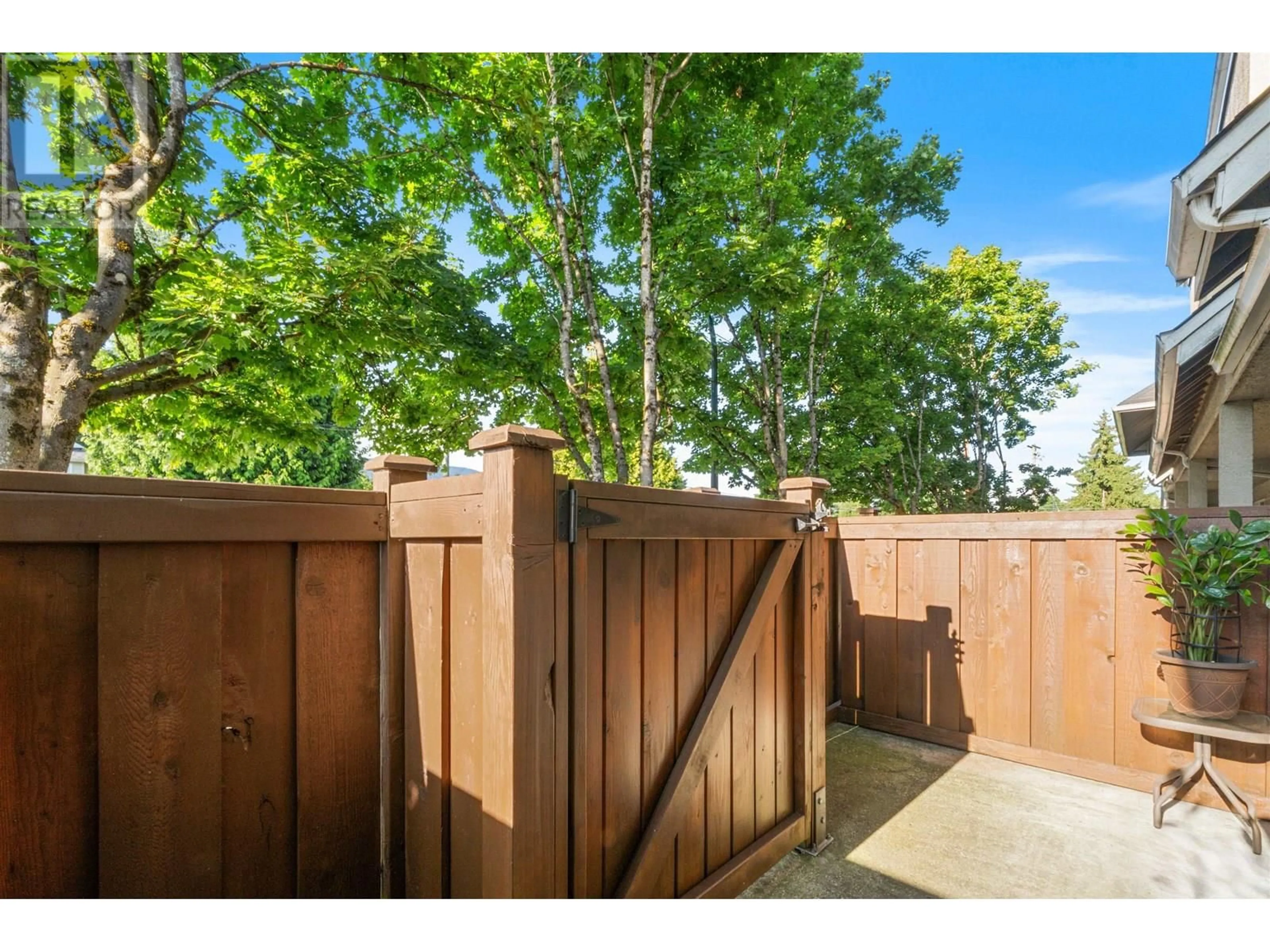 Patio, forest/trees view for 102 - 1570 PRAIRIE AVENUE, Port Coquitlam British Columbia V3B1T4