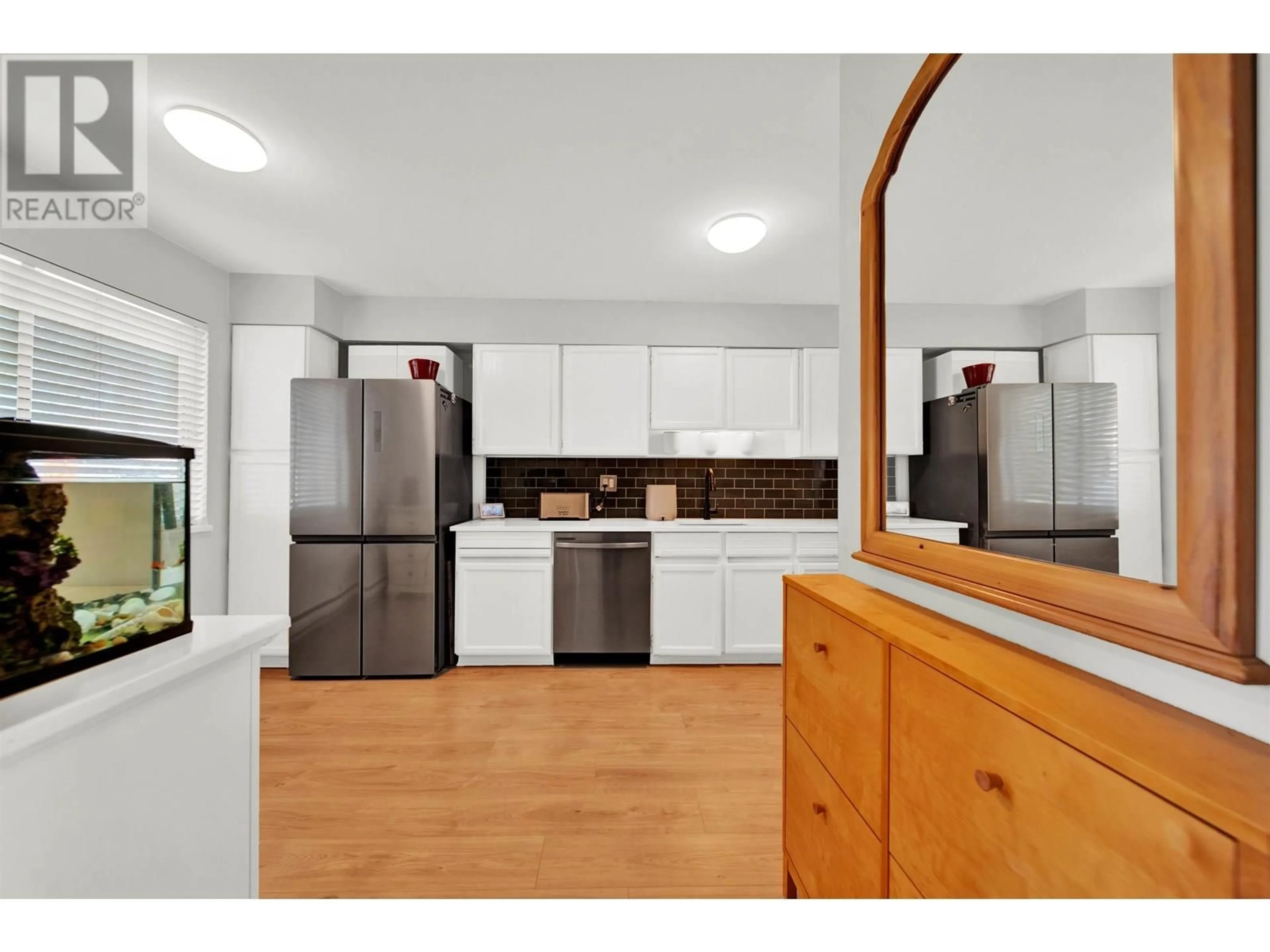 Open concept kitchen, wood/laminate floor for 21 - 10680 SPRINGMONT DRIVE, Richmond British Columbia V7E1W1