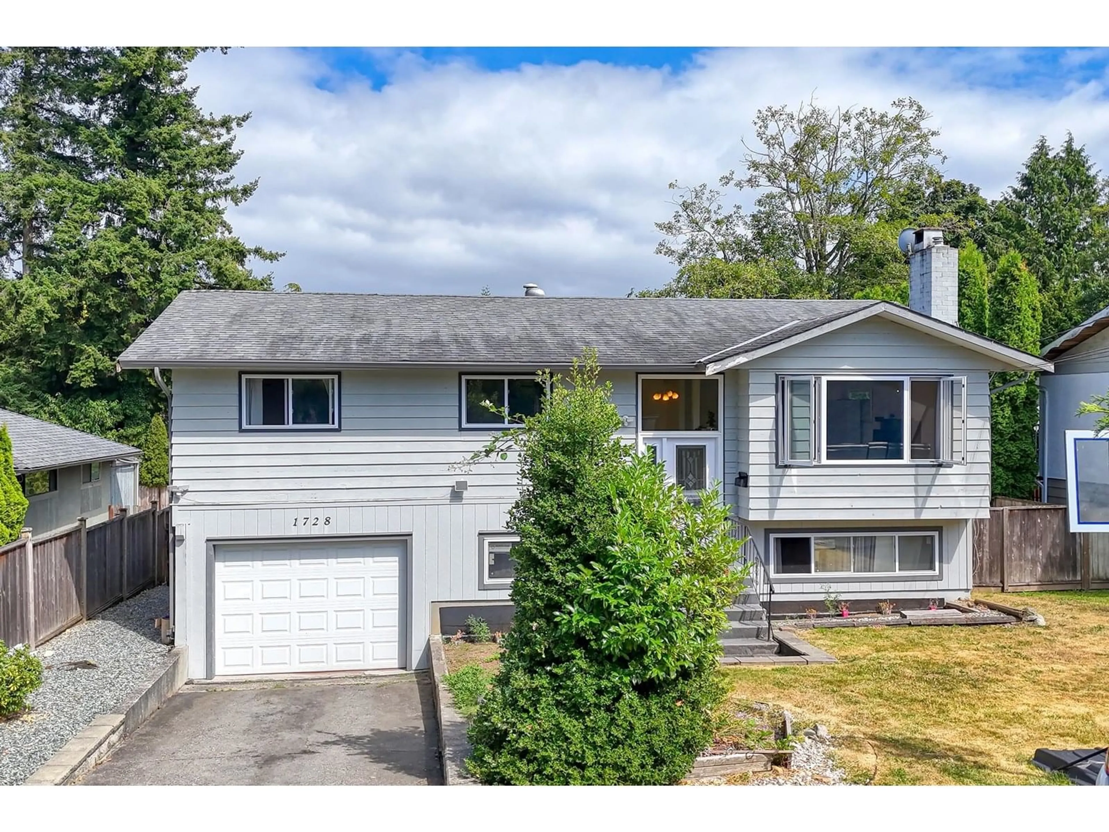 Home with vinyl exterior material, street for 1728 156, Surrey British Columbia V4A4T1