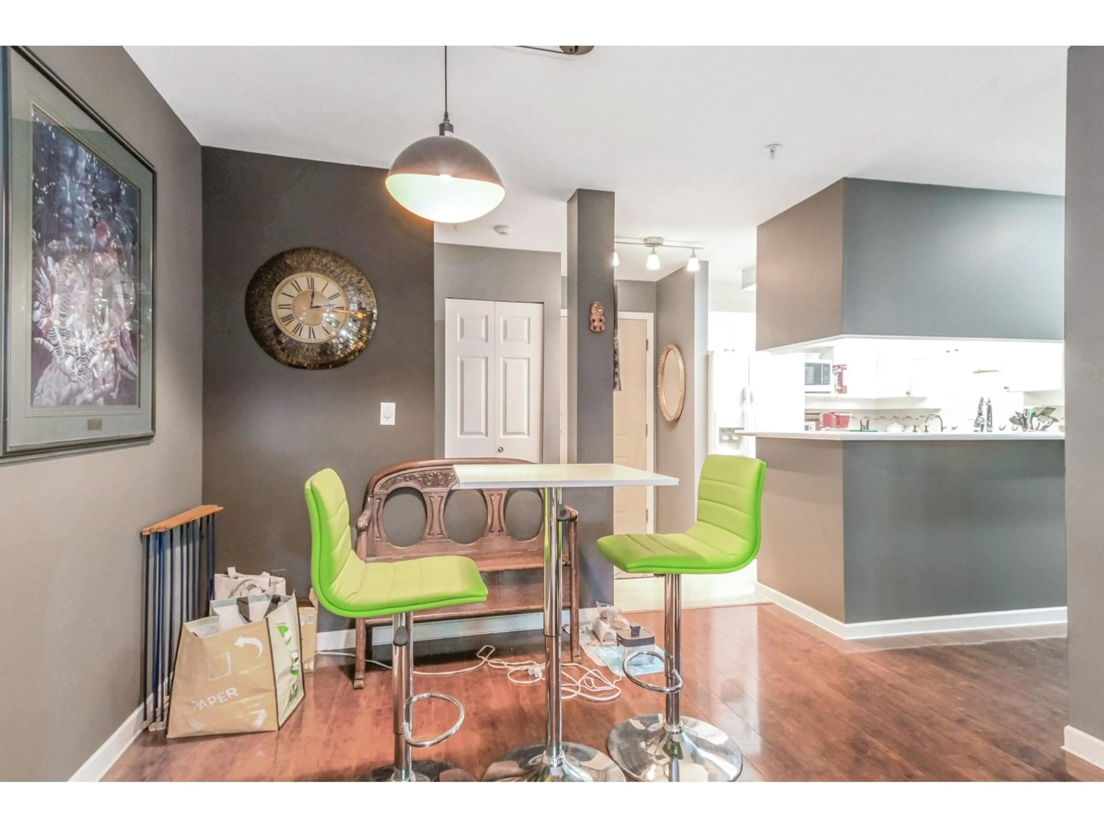 Open concept kitchen, wood/laminate floor for 107 - 22015 48, Langley British Columbia V3A8L3