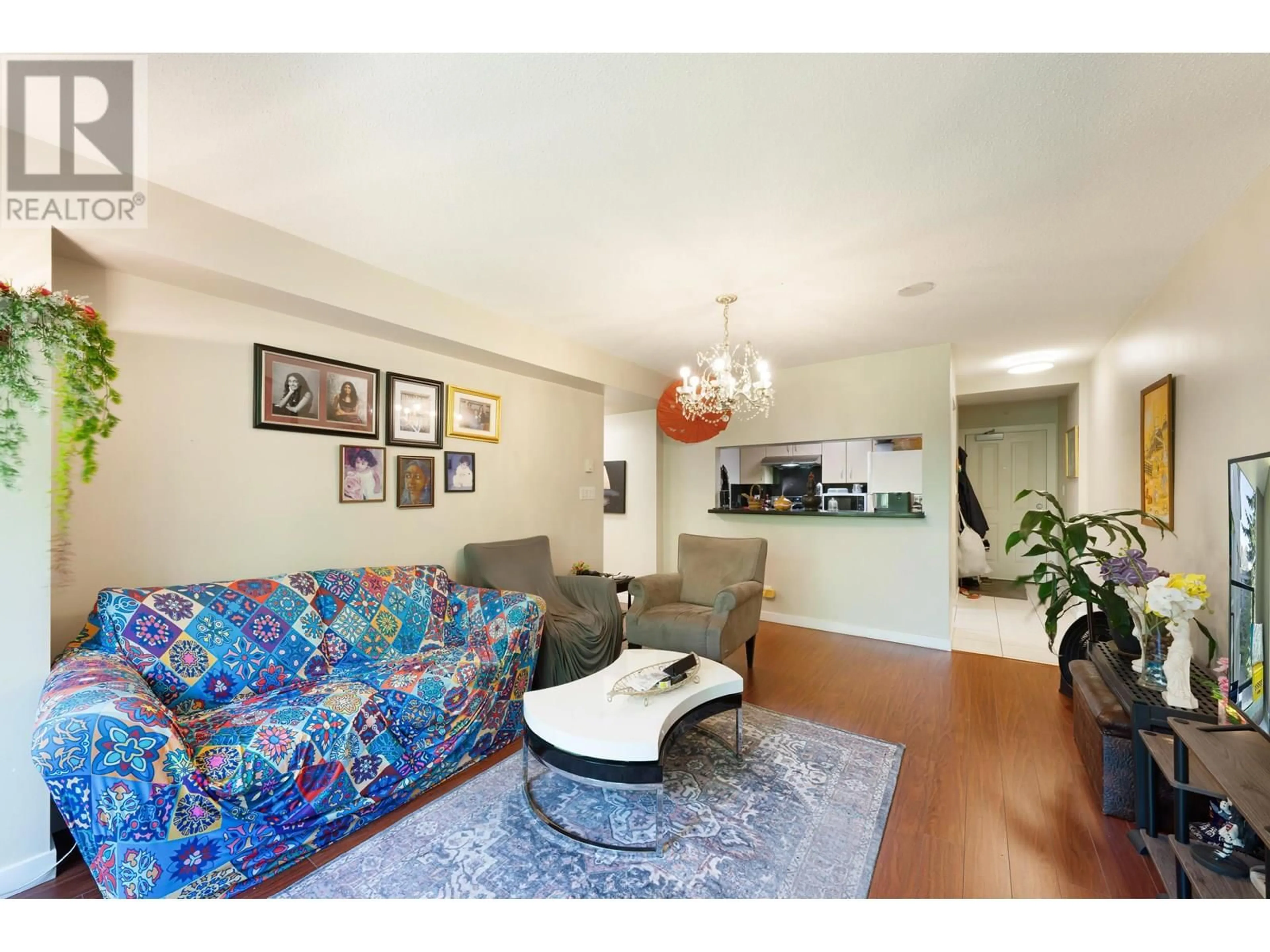 Living room with furniture, unknown for 403 - 3663 CROWLEY DRIVE, Vancouver British Columbia V5R6H4