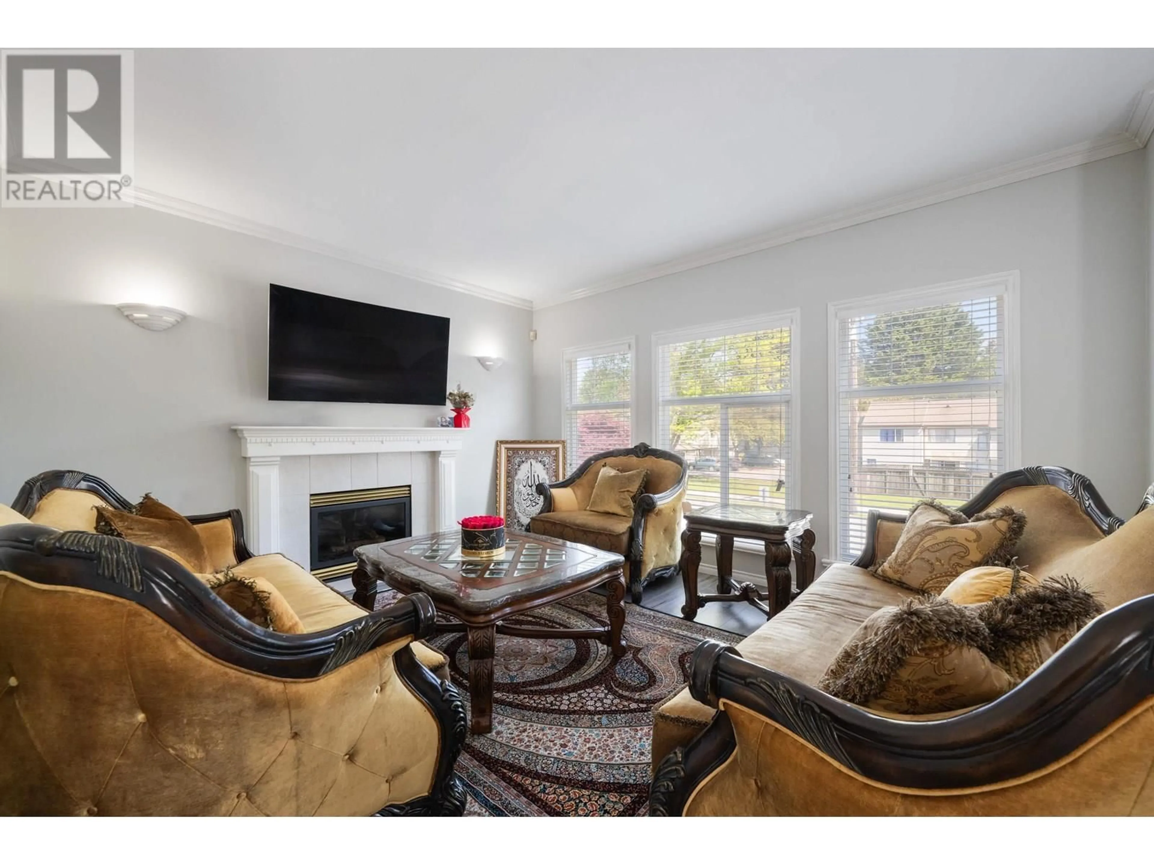 Living room with furniture, wood/laminate floor for 3073 COAST MERIDIAN ROAD, Port Coquitlam British Columbia V3B3N1