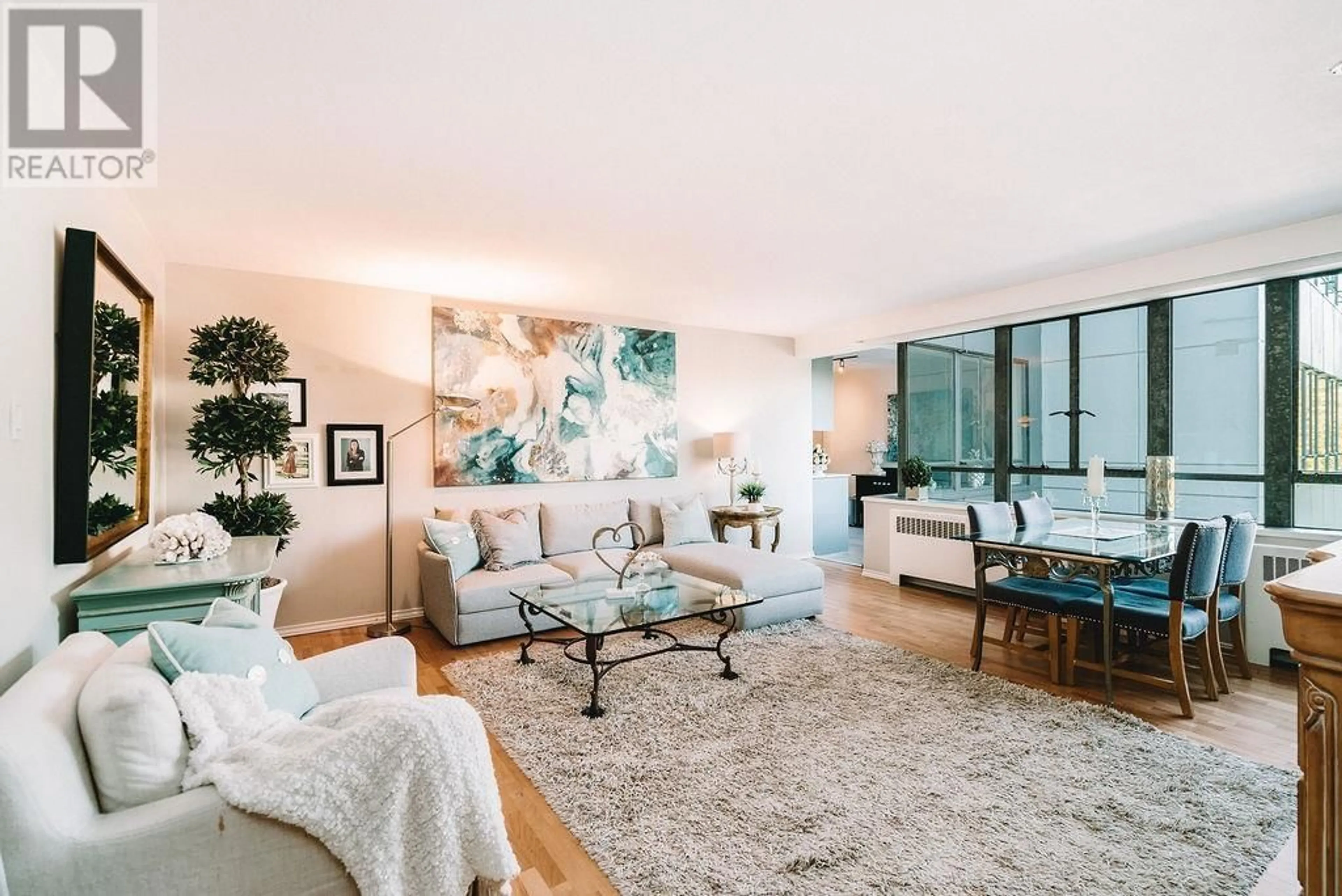 Living room with furniture, unknown for 310 - 1445 MARPOLE AVENUE, Vancouver British Columbia V6H1S5