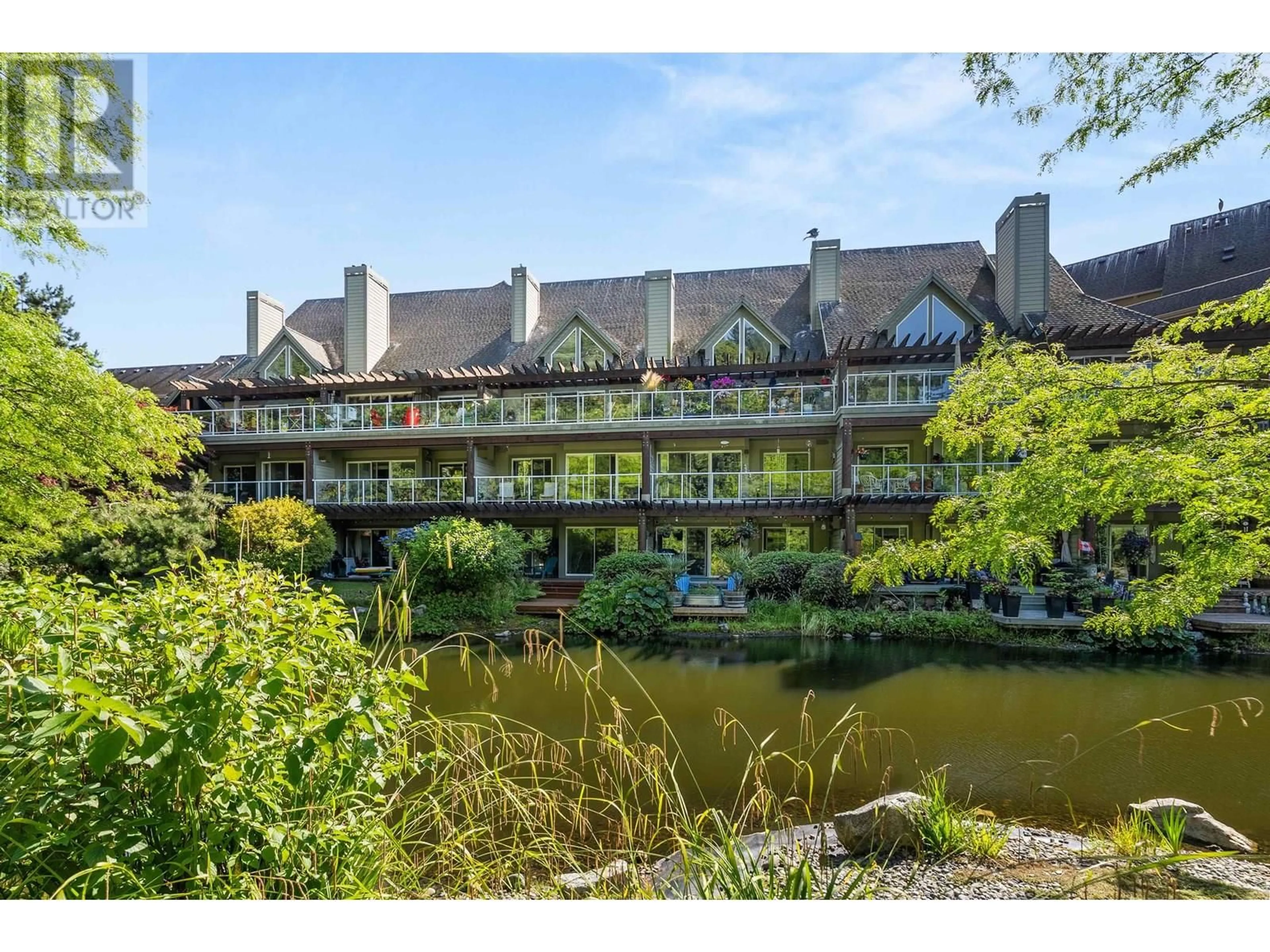A pic from outside/outdoor area/front of a property/back of a property/a pic from drone, water/lake/river/ocean view for 320 - 1120 TSATSU SHORES DRIVE, Tsawwassen British Columbia V4M4G3