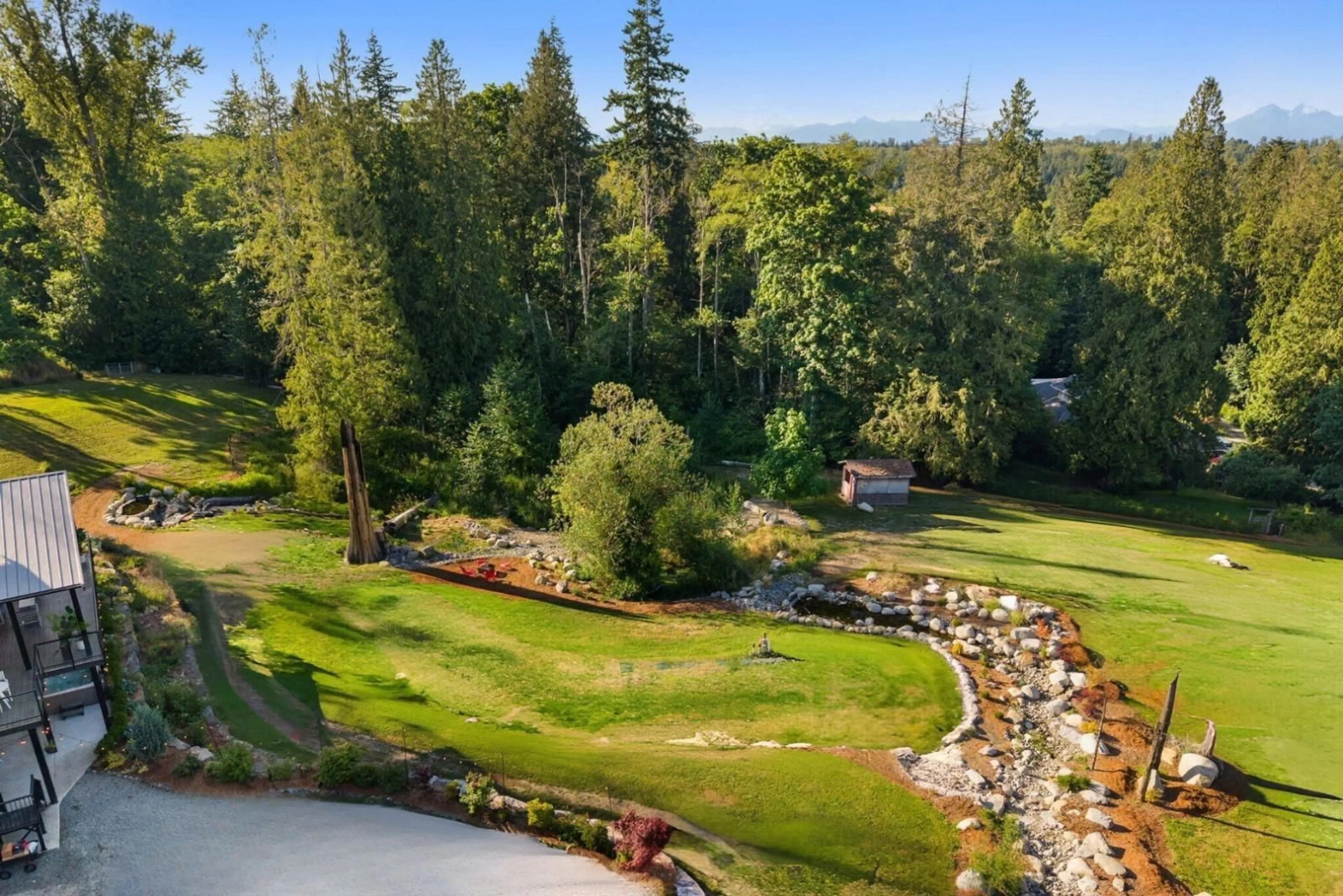 A pic from outside/outdoor area/front of a property/back of a property/a pic from drone, water/lake/river/ocean view for 205 210, Langley British Columbia V2Z2G6