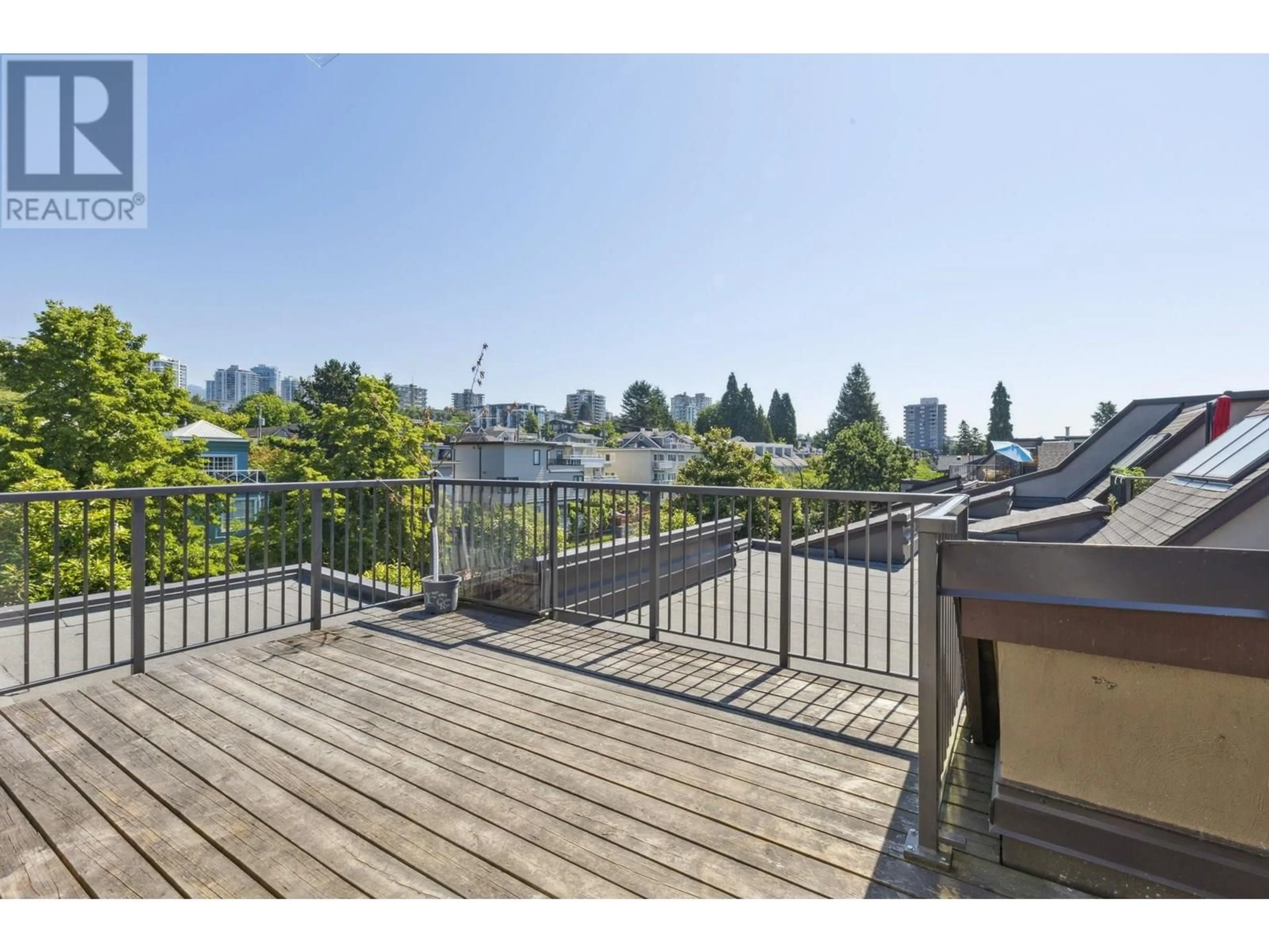 Patio, city buildings view from balcony for 312 - 251 4TH STREET, North Vancouver British Columbia V7M1H8
