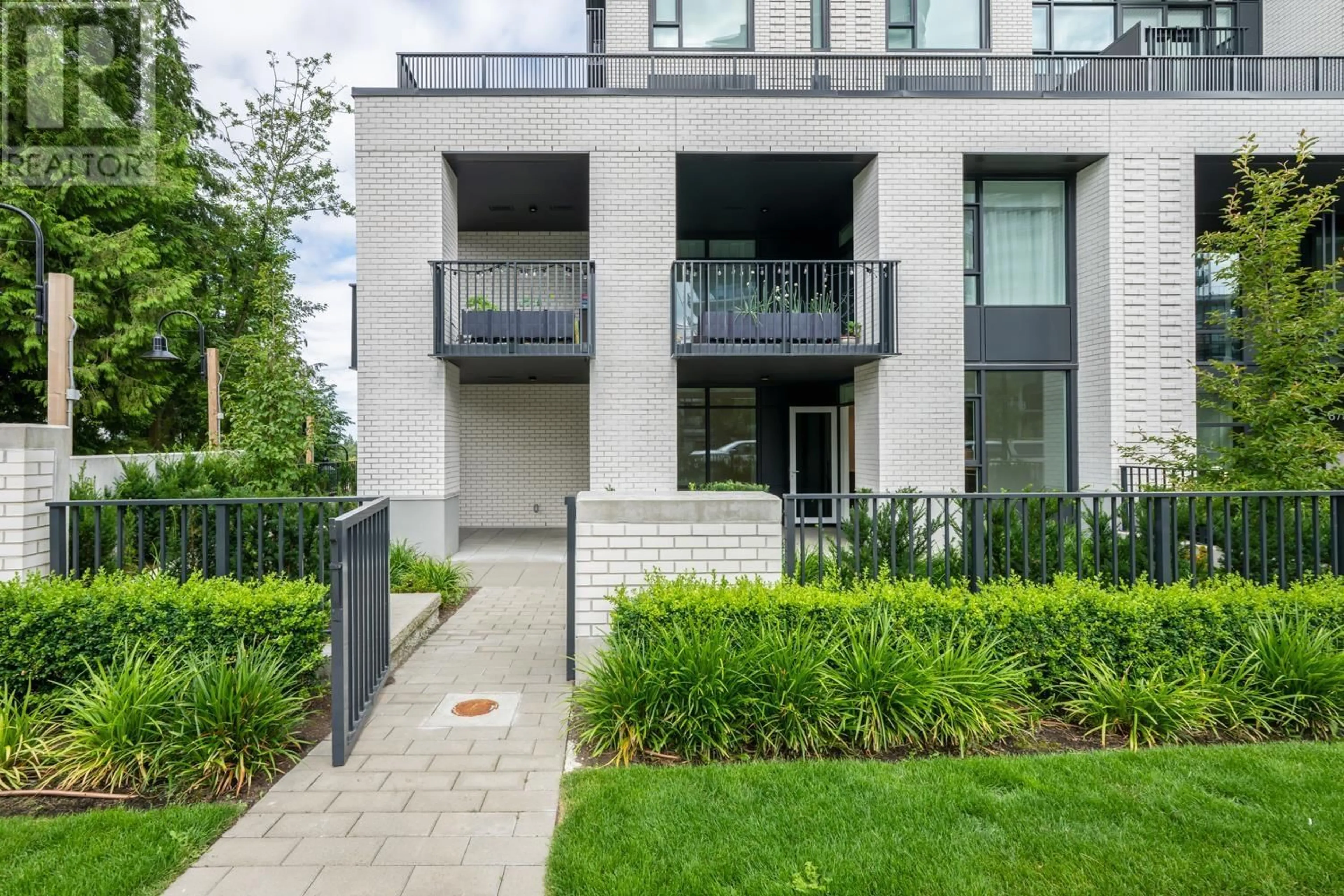 Home with brick exterior material, street for 201 - 8750 UNIVERSITY CRESCENT, Burnaby British Columbia V5A0G9