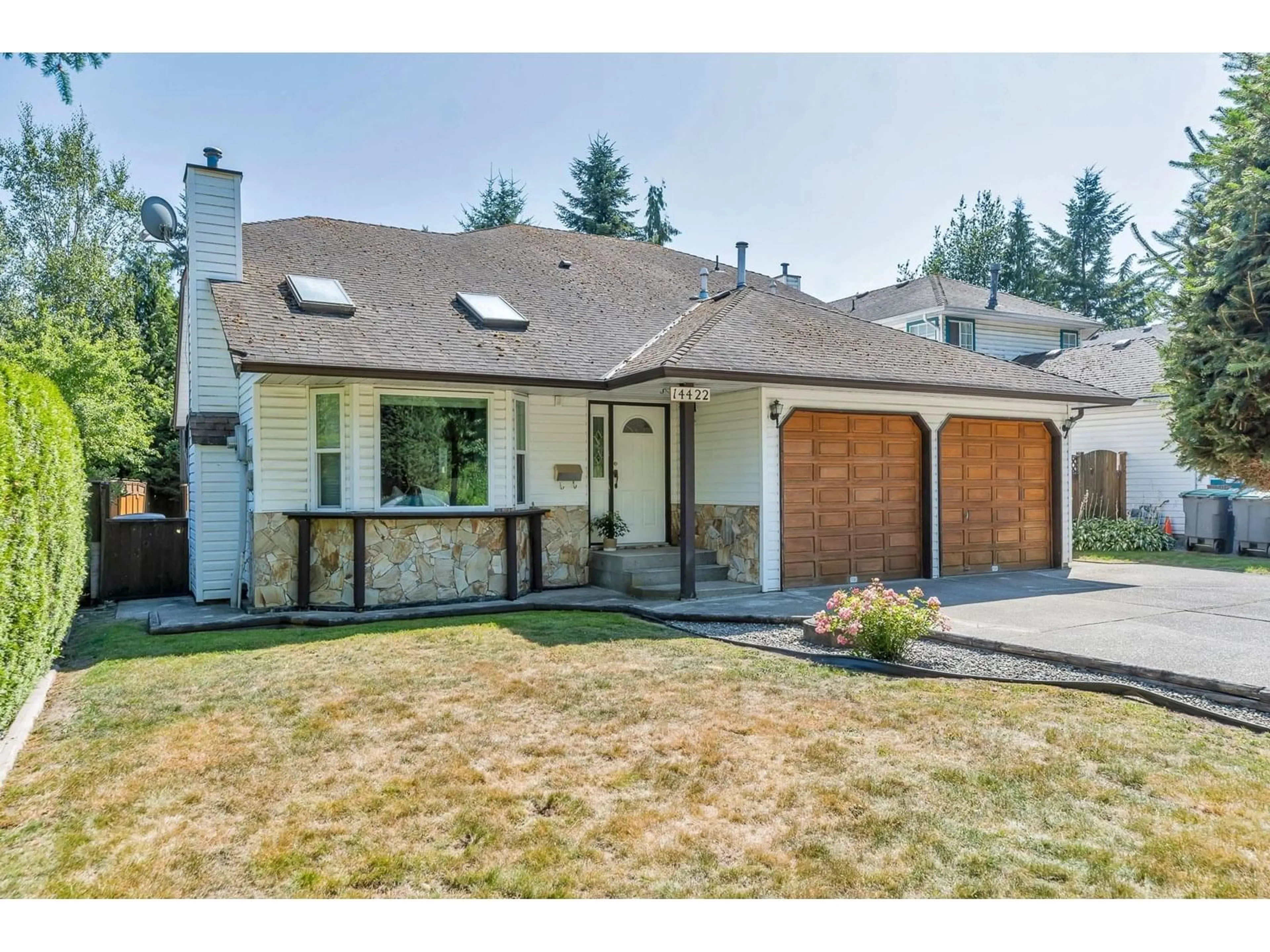 Home with vinyl exterior material, street for 14422 GLADSTONE, Surrey British Columbia V3R5R9