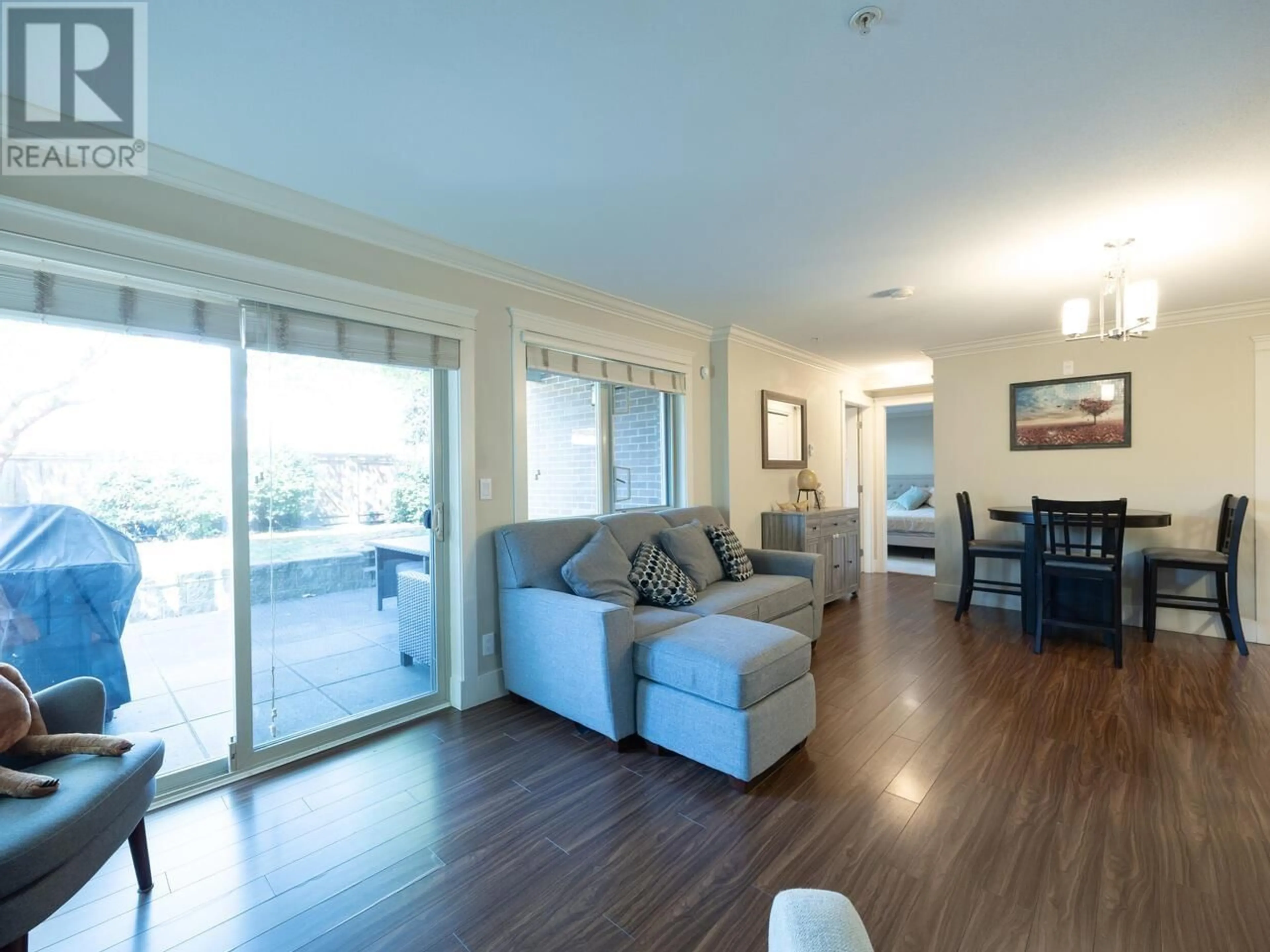 Living room with furniture, wood/laminate floor for 111 - 2175 FRASER AVENUE, Port Coquitlam British Columbia V3B0H8