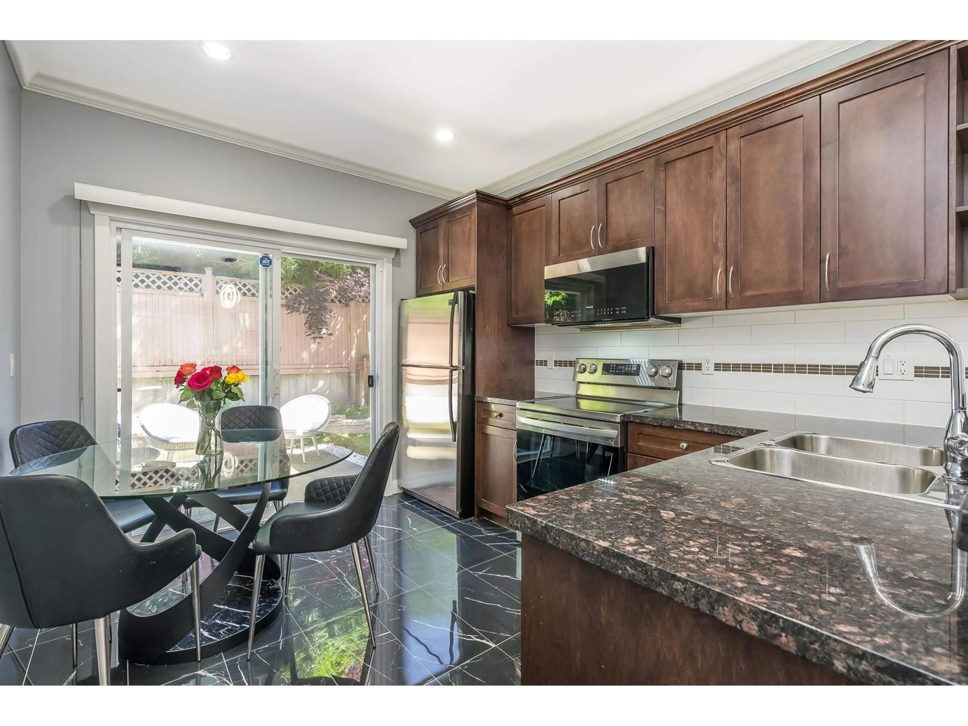 Open concept kitchen, ceramic/tile floor for 30 - 19977 71, Langley British Columbia V2Y0E1