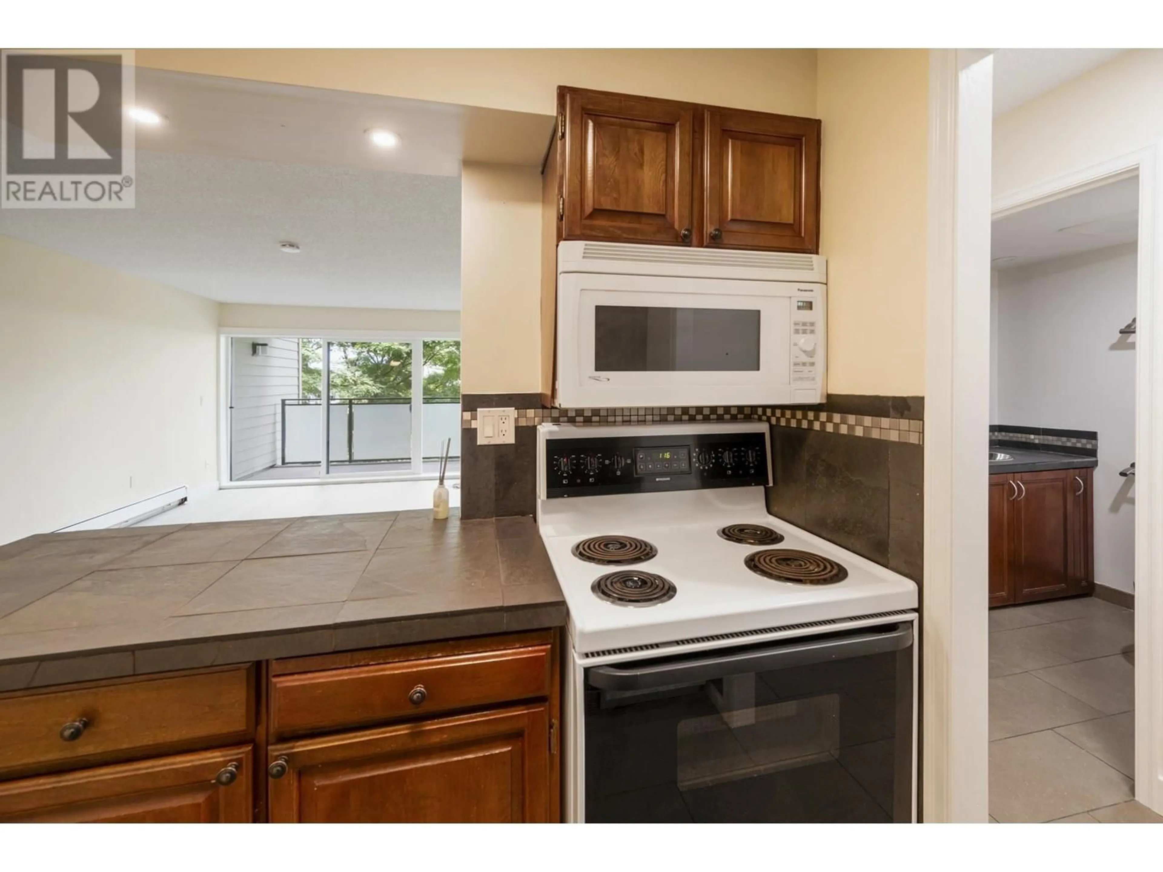 Standard kitchen, ceramic/tile floor for 302 - 1066 8TH AVENUE, Vancouver British Columbia V5T1T9