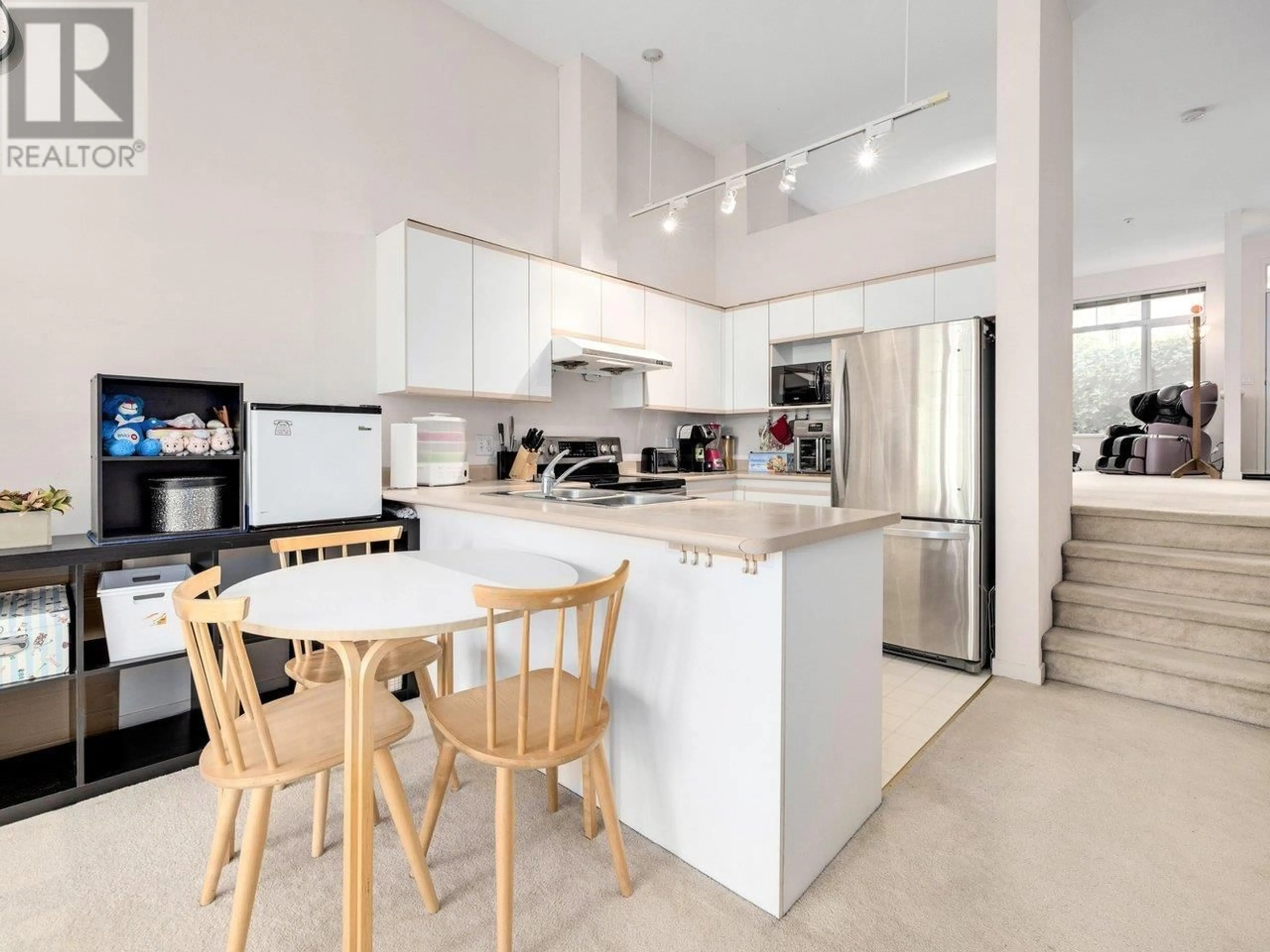 Open concept kitchen, ceramic/tile floor for 1 - 3576 RAINIER PLACE, Vancouver British Columbia V5S4T3