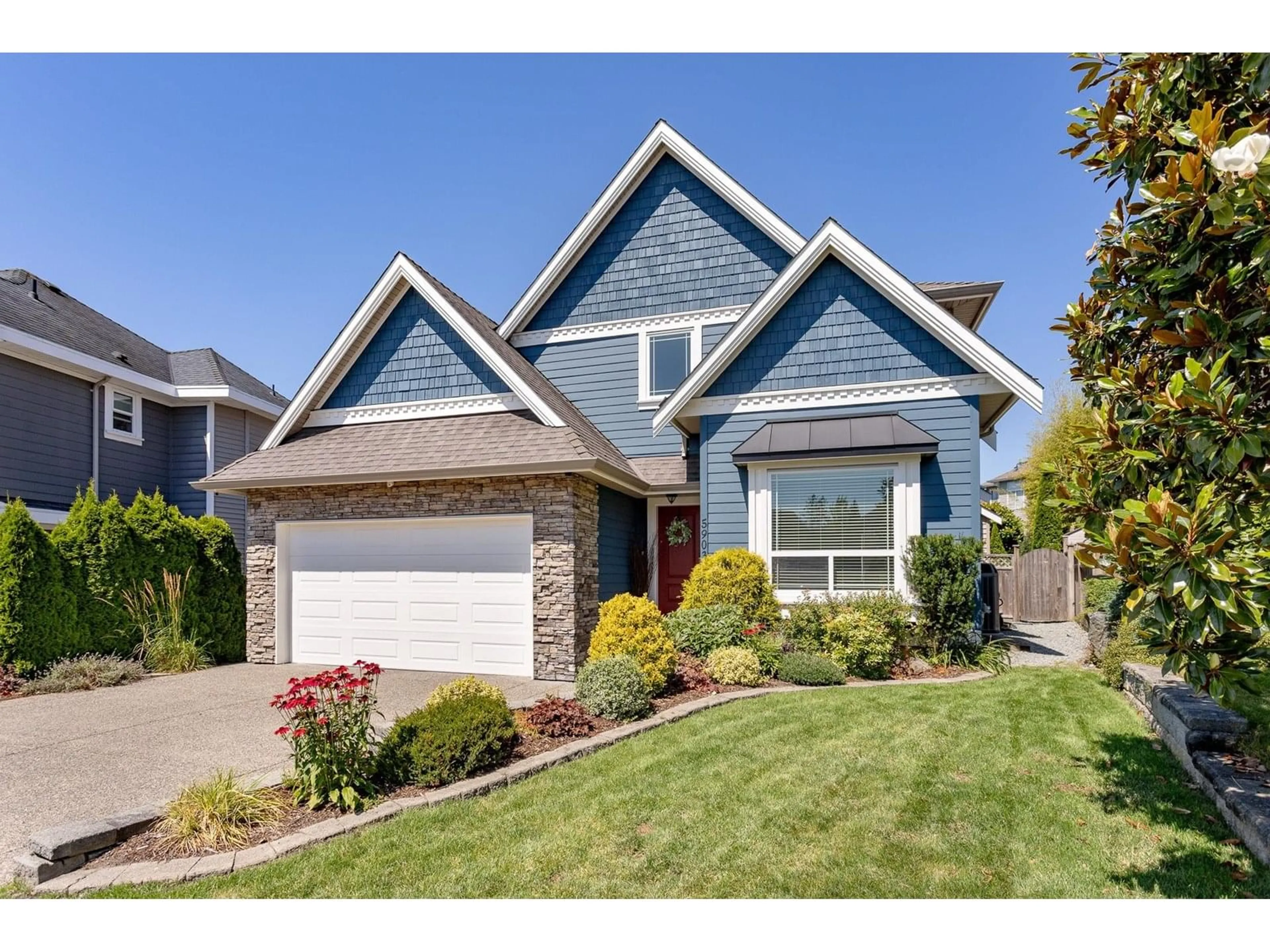 Home with vinyl exterior material, street for 5903 164A, Surrey British Columbia V3S1J9