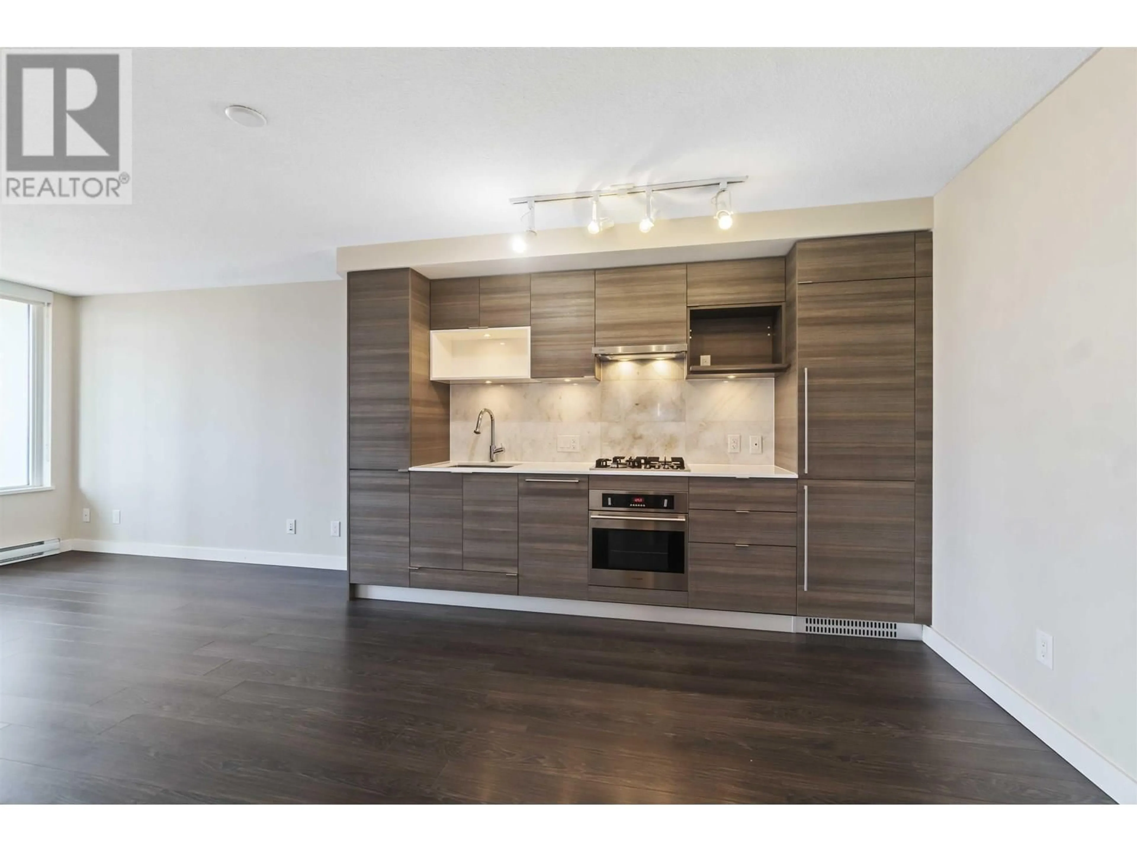 Open concept kitchen, wood/laminate floor for 1107 - 602 COMO LAKE AVENUE, Coquitlam British Columbia V3J0G2