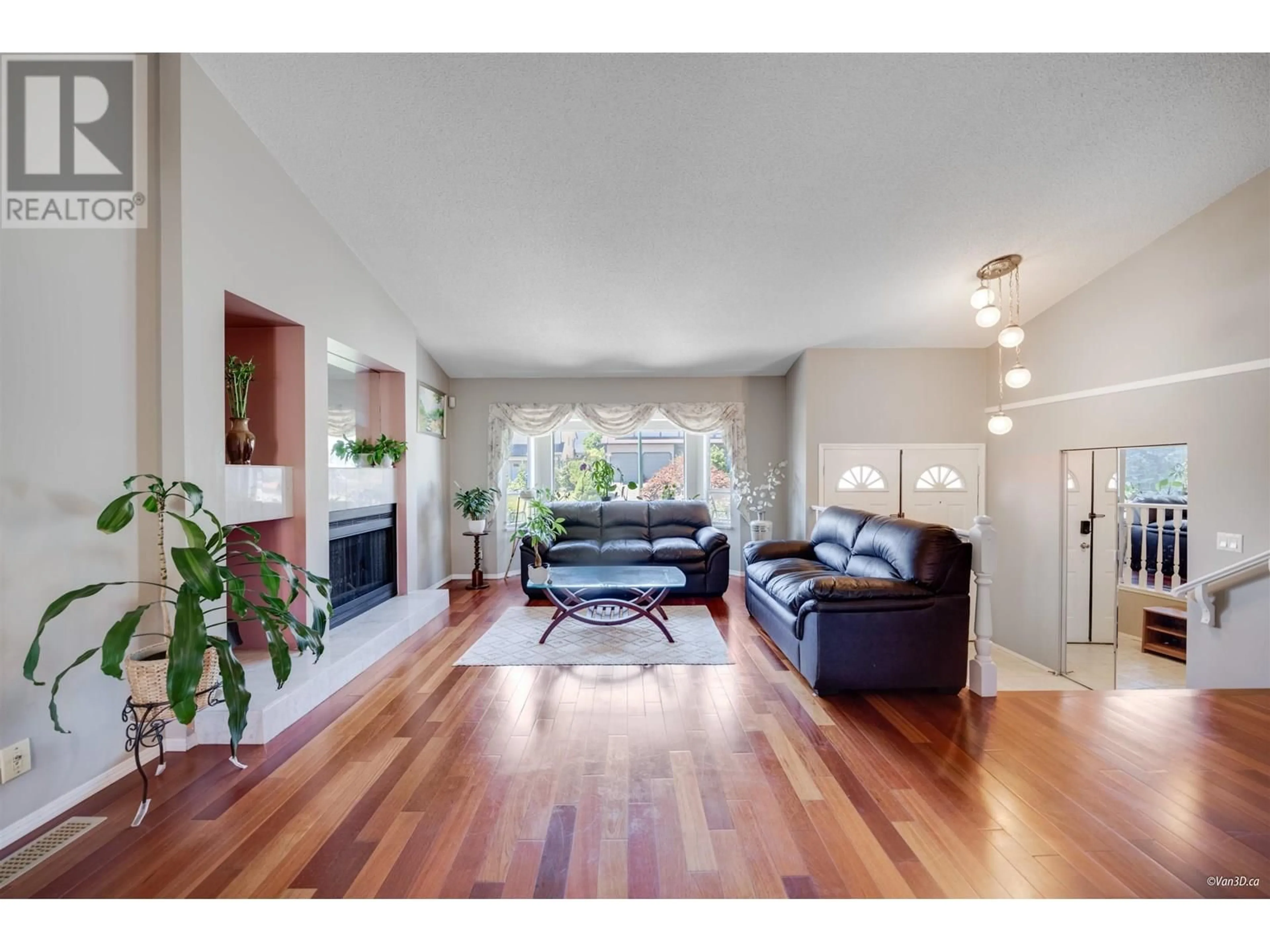Living room with furniture, wood/laminate floor for 1295 DAIMLER STREET, Coquitlam British Columbia V3B6P5