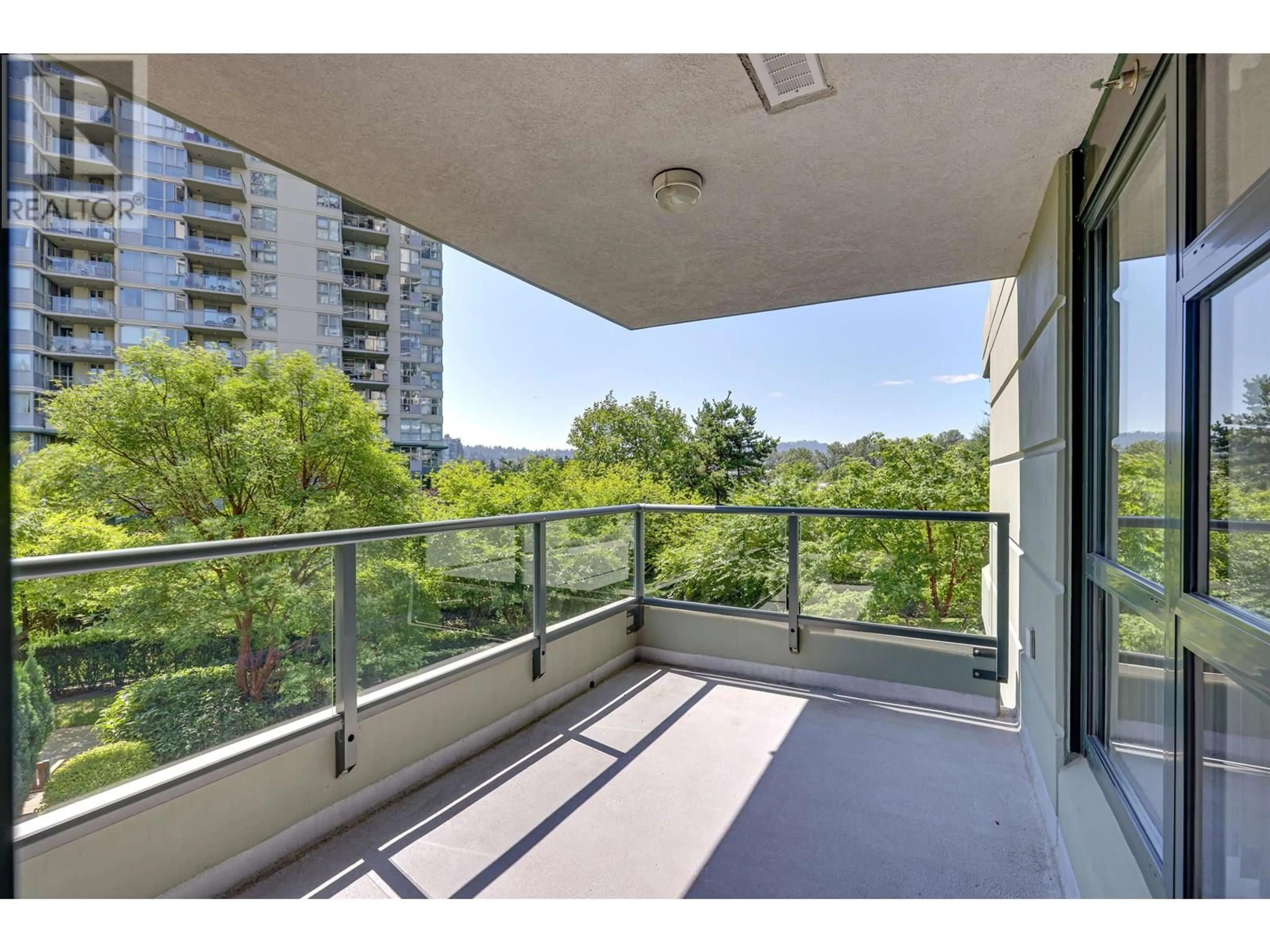 Balcony in the apartment, city buildings view from balcony for 104 - 288 UNGLESS WAY, Port Moody British Columbia V3H0C9
