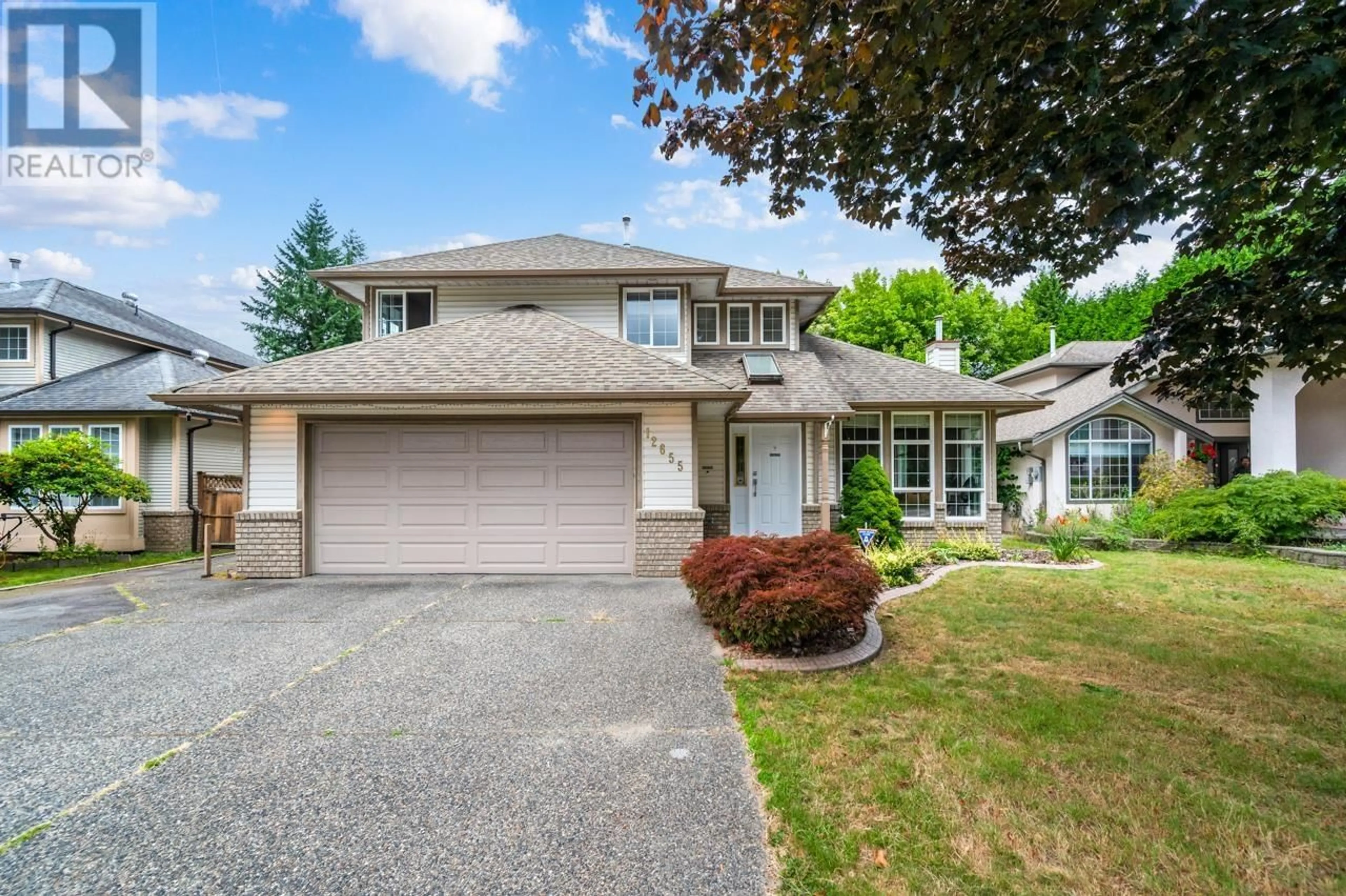 Home with vinyl exterior material, street for 12655 228 STREET, Maple Ridge British Columbia V2X6M9