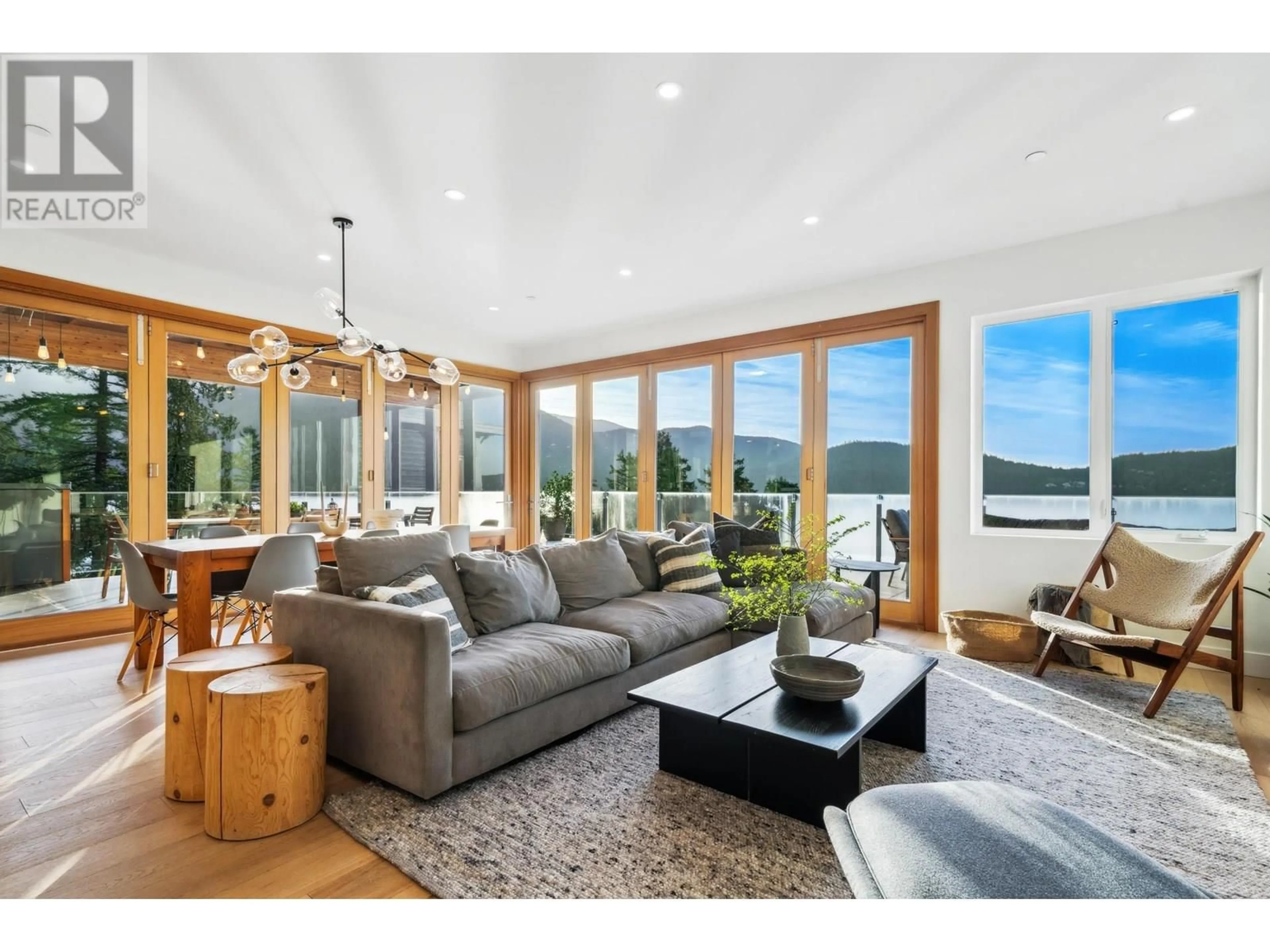 Living room with furniture, wood/laminate floor for 5577 INDIAN RIVER DRIVE, North Vancouver British Columbia V7G2T7